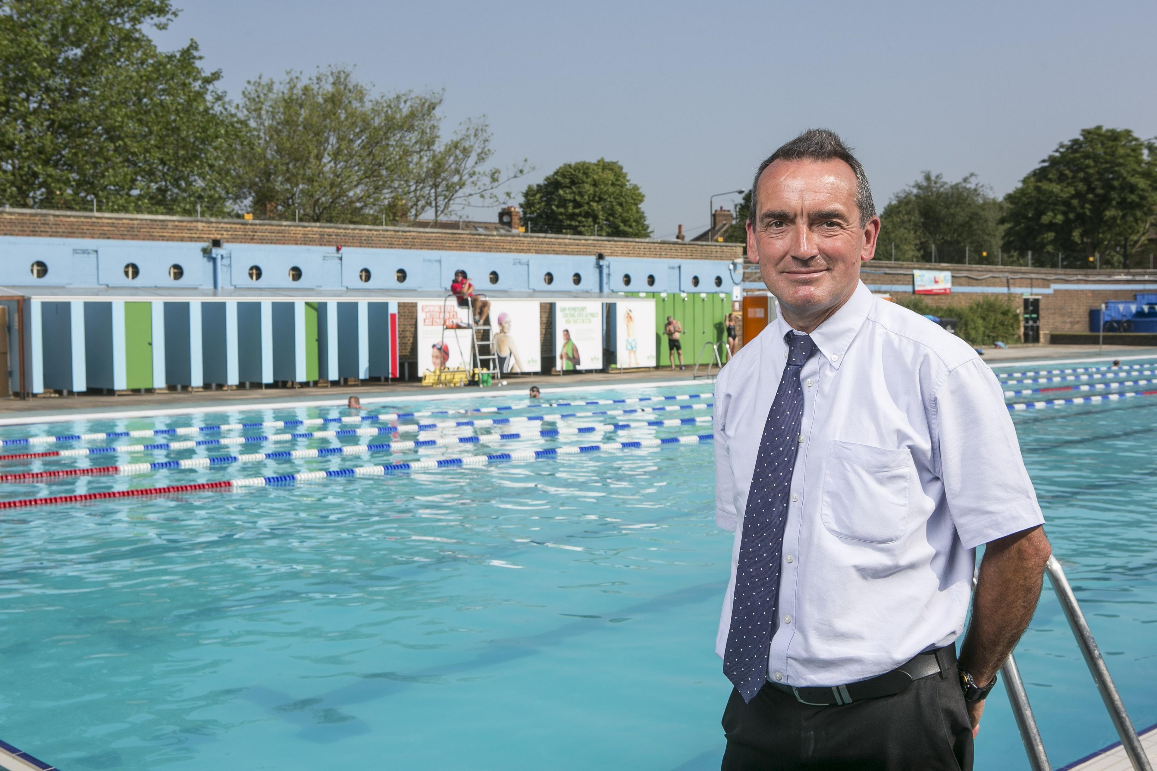 Managing director of GLL pools Mark Sesnan stands beside Charlton Lido