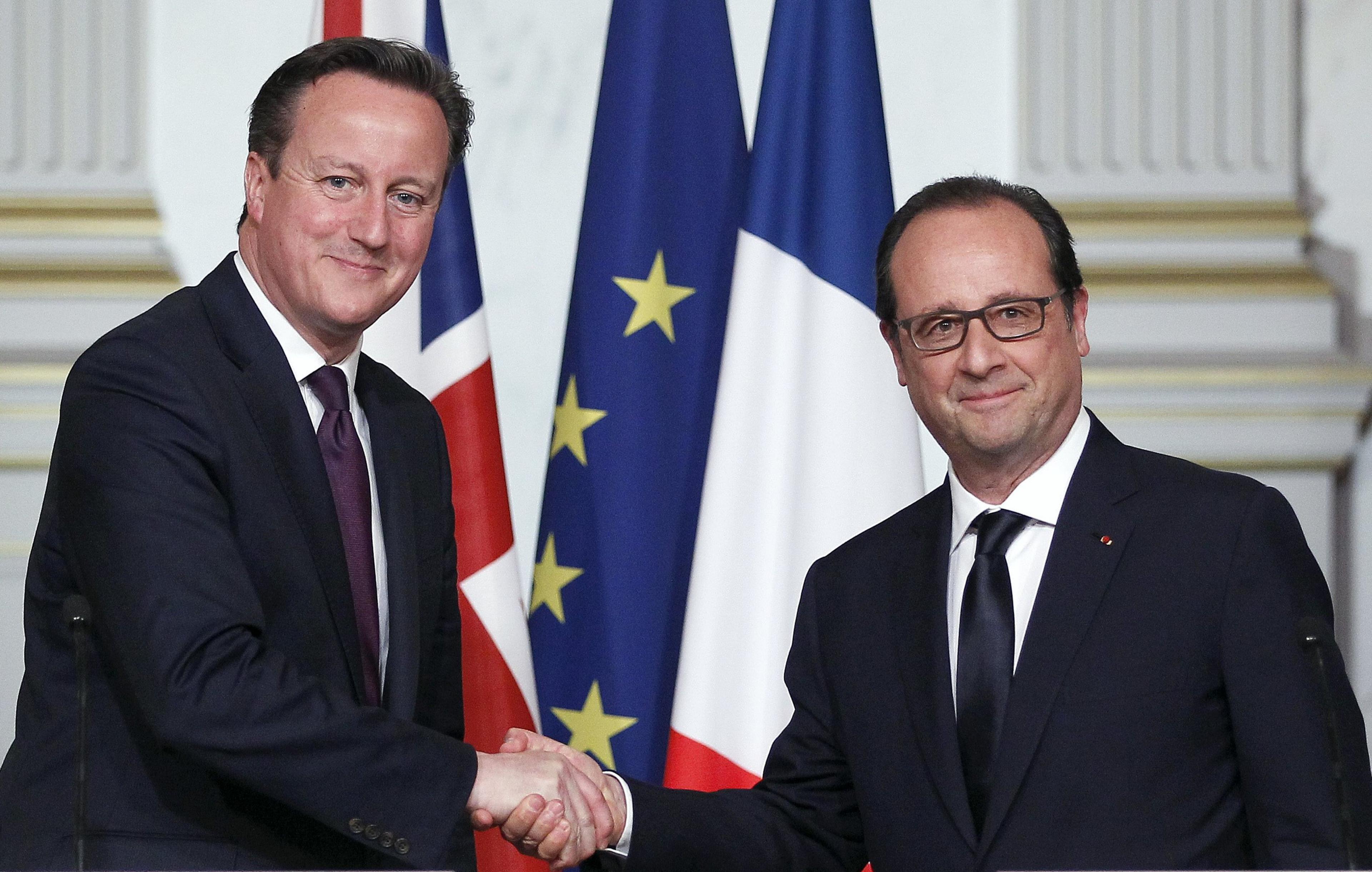 Mr Cameron and Mr Hollande pictures in Paris in May