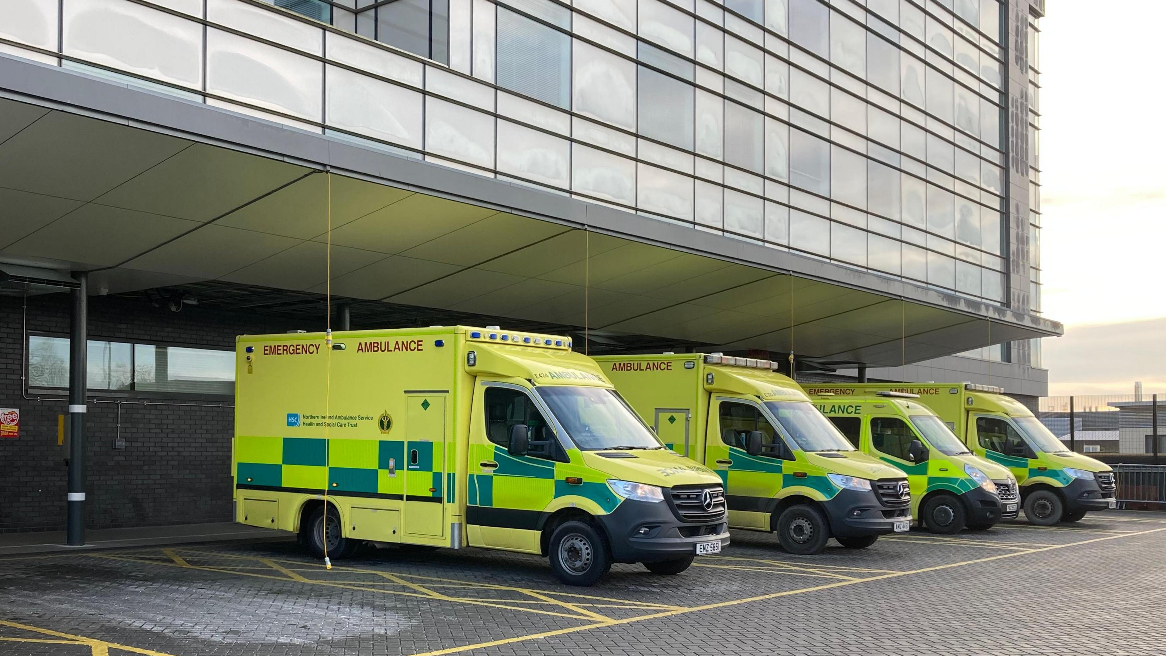 Four ambulances parked outside of the Ulster Hospital A&E in east Belfast.