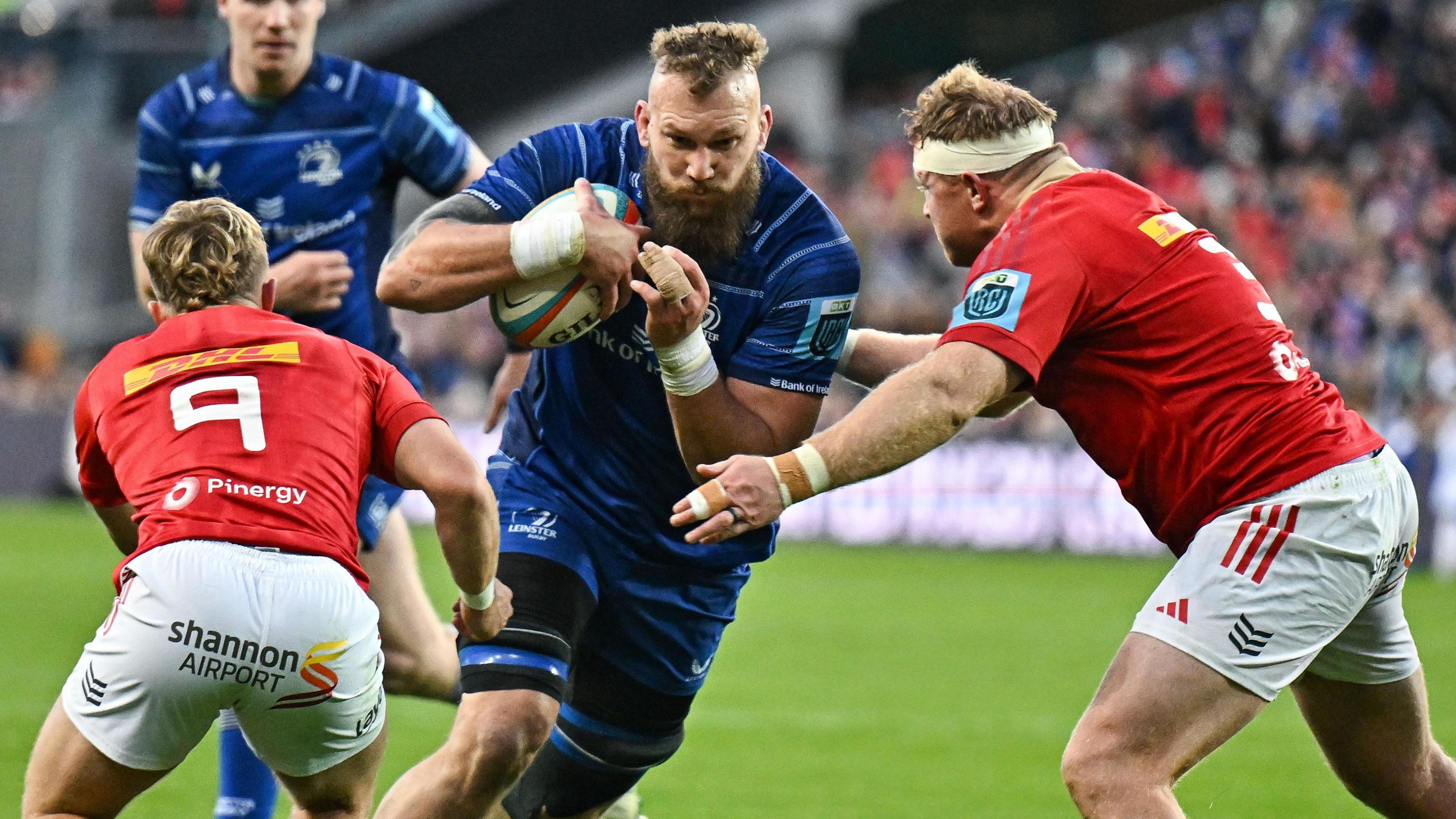 Leinster's RG Snyman is about to barge past former Munster team-mates Craig Casey and Stephen Archer to score Leinster's bonus-point clinching try at Croke Park