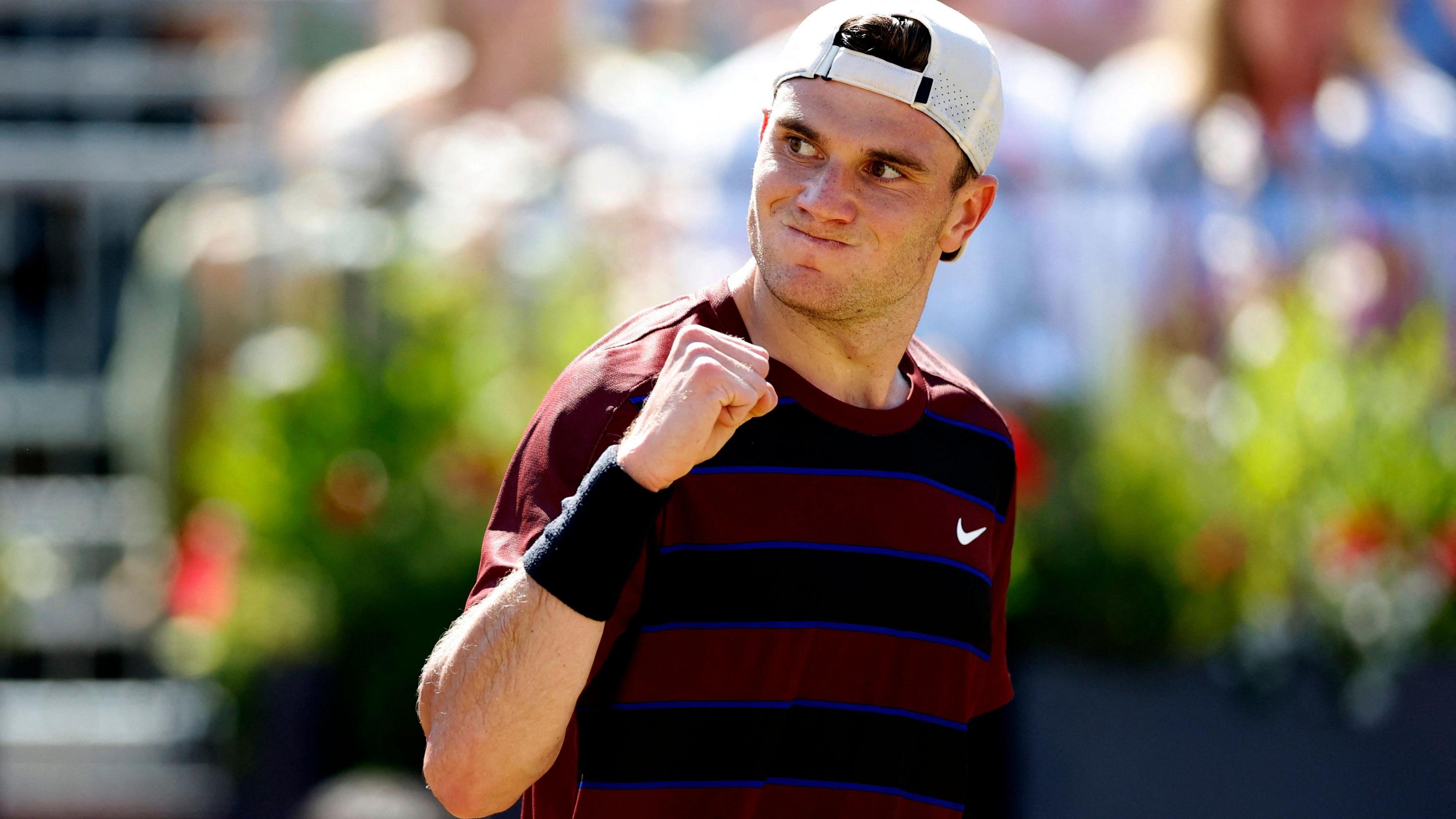 Jack Draper celebrates on his way to winning at Queen's in the second round