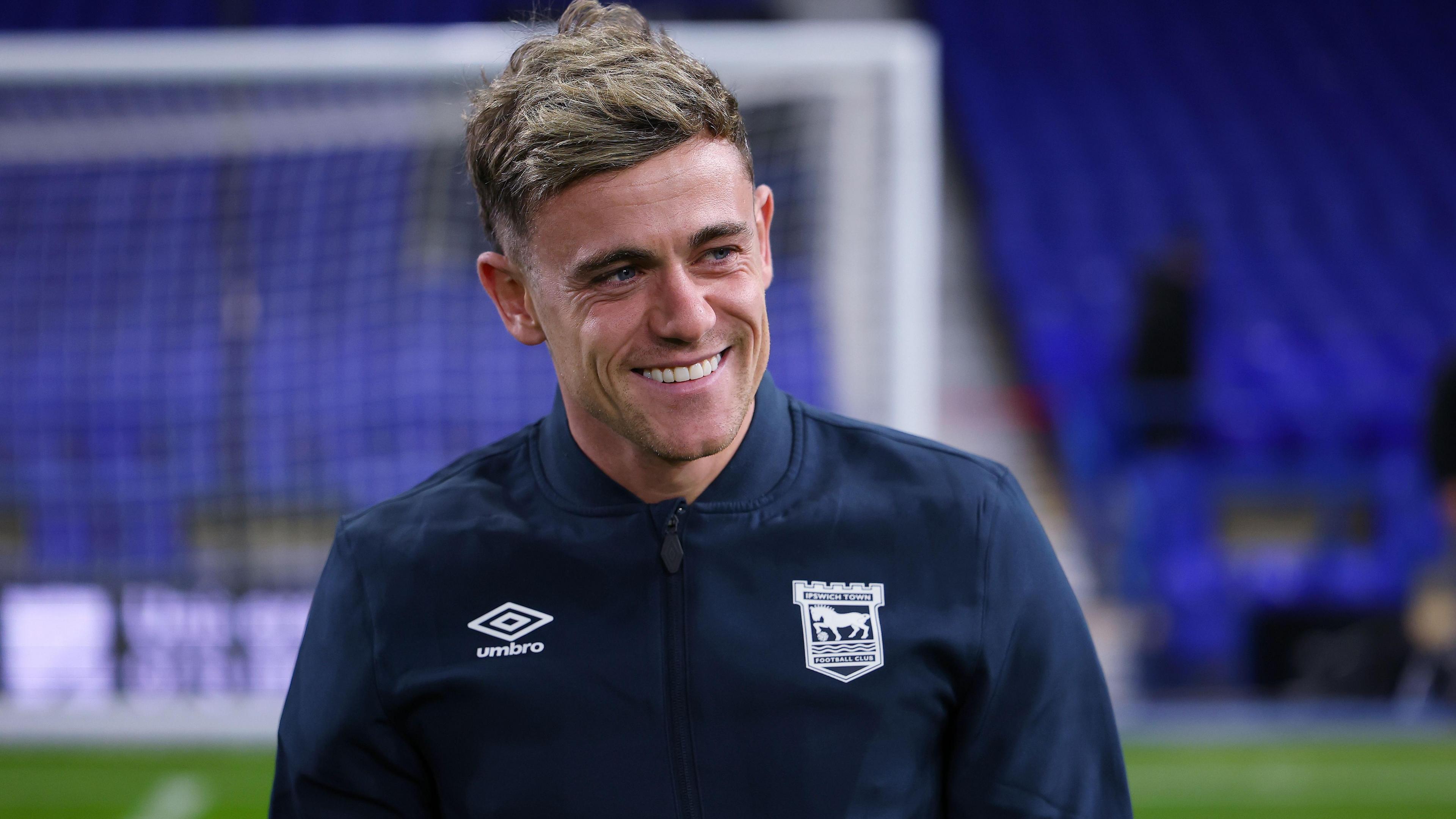 A smiling Sammie Szmodics