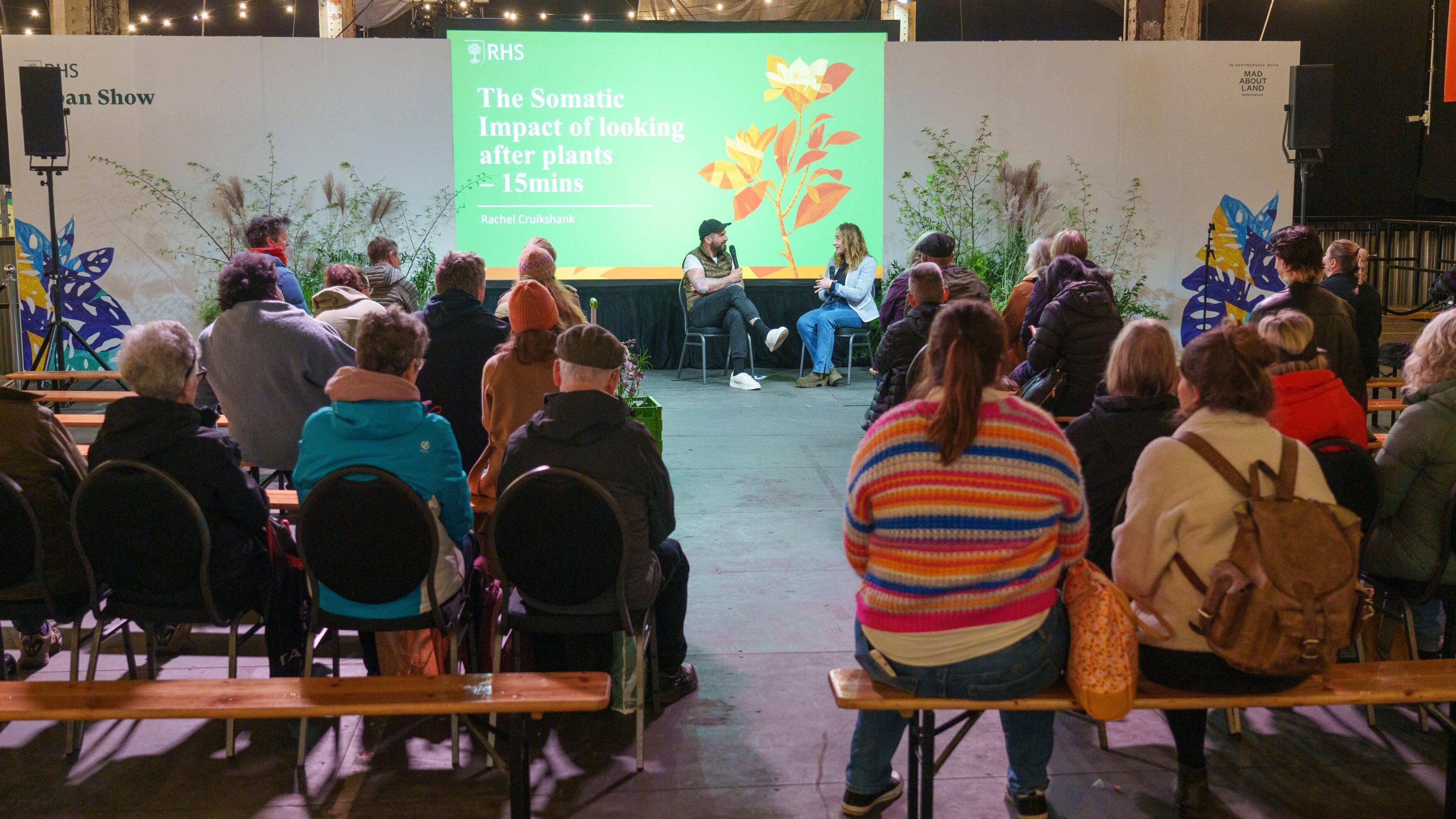 People listen to a talk at the RHS Urban Show in Manchester