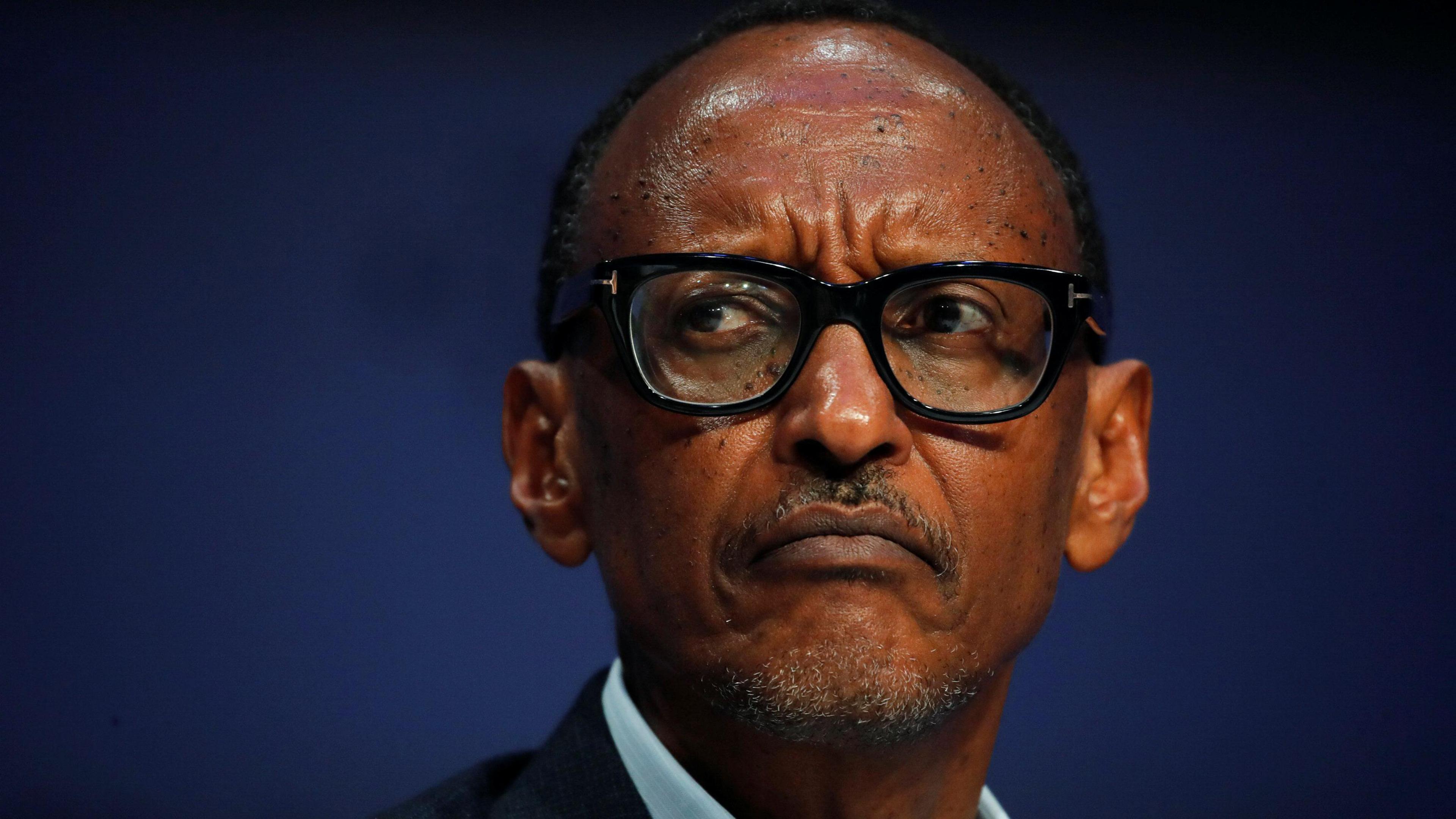 A picture of President Paul Kagame against a dark blue background