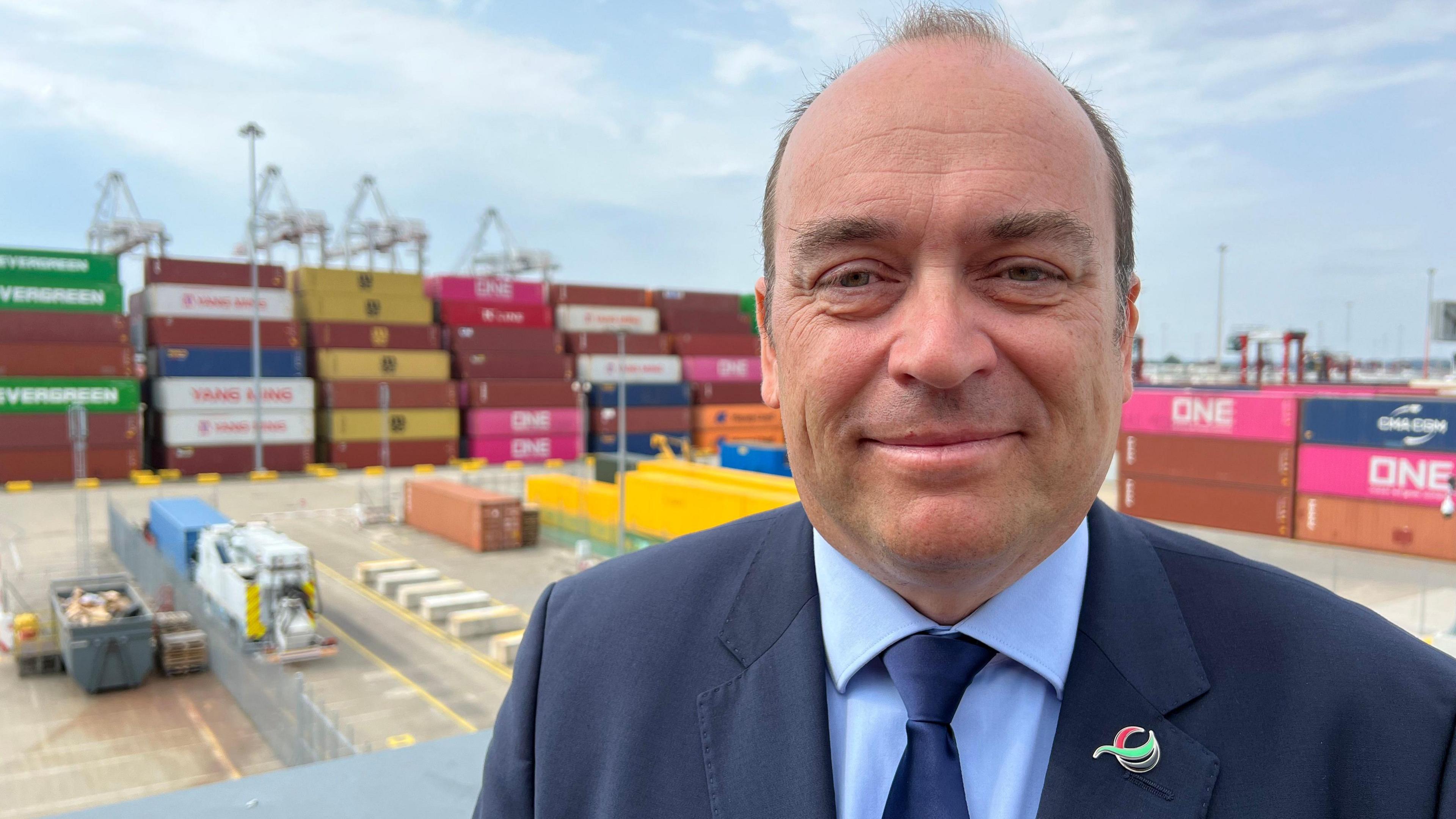 John Trenchard of DP World pictured in front of a containership being unloaded in Southampton.