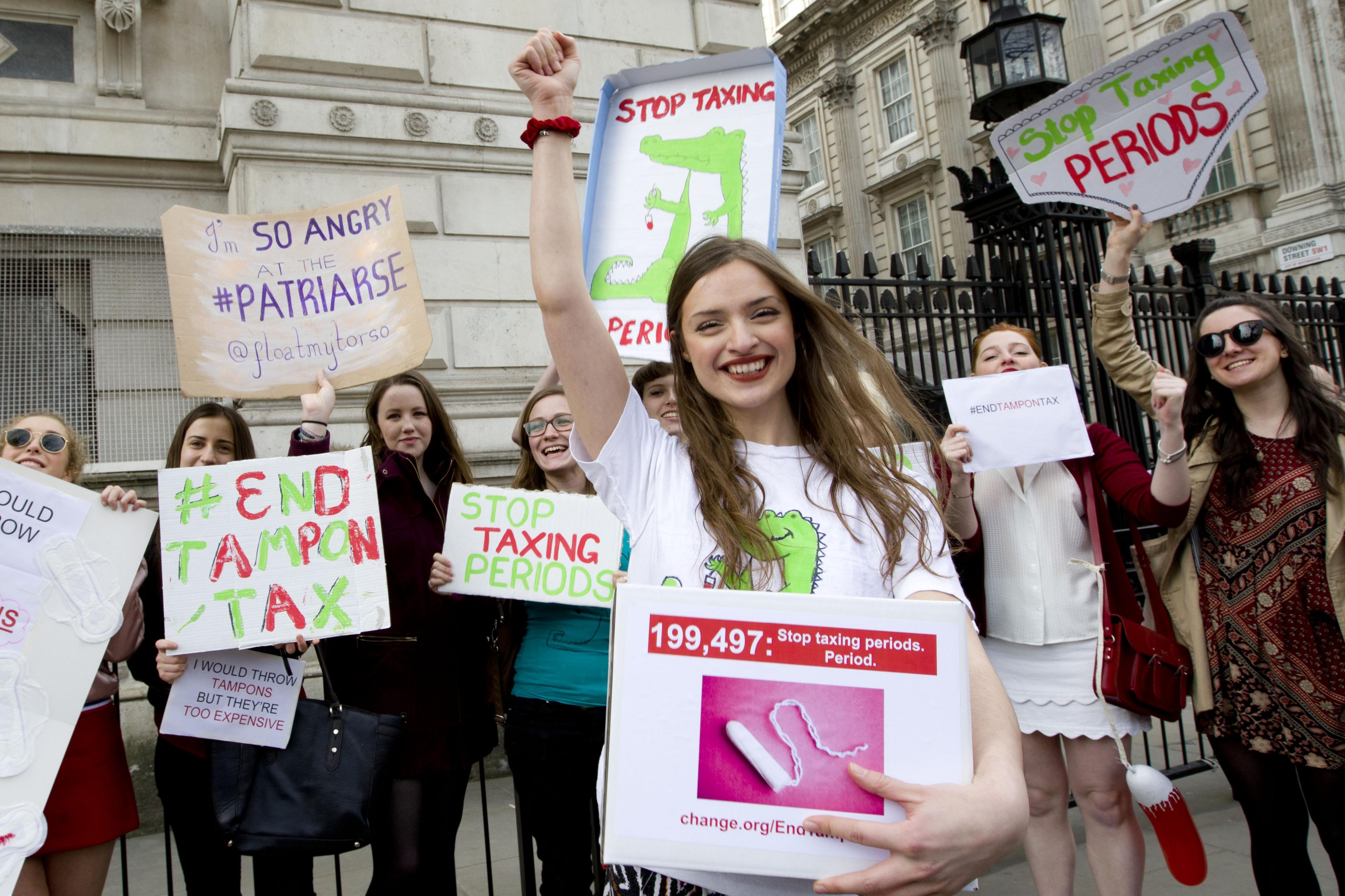 Laura Coryton holds the box of signatures as she presents her petition to Downing Street.