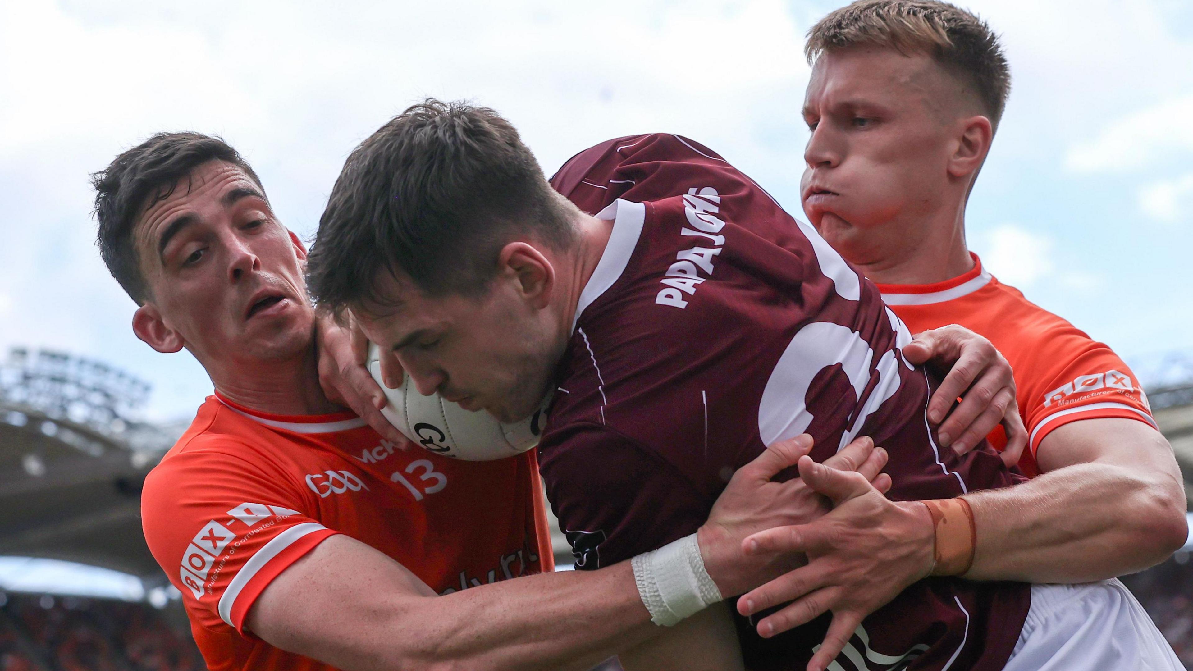 Armagh's Rory Grugan and Rian O'Neill tackle Galway's Cein Darcy in the All-Ireland Final last July