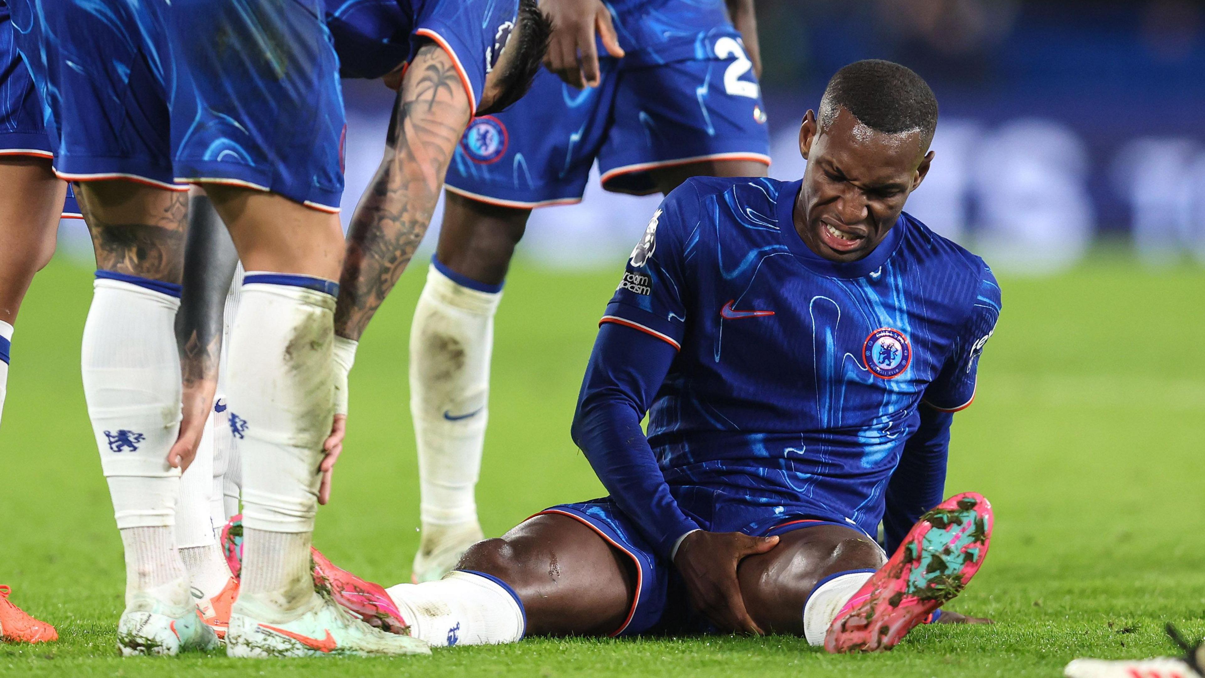 Chelsea striker Nicolas Jackson goes down injured in Premier League match against West Ham