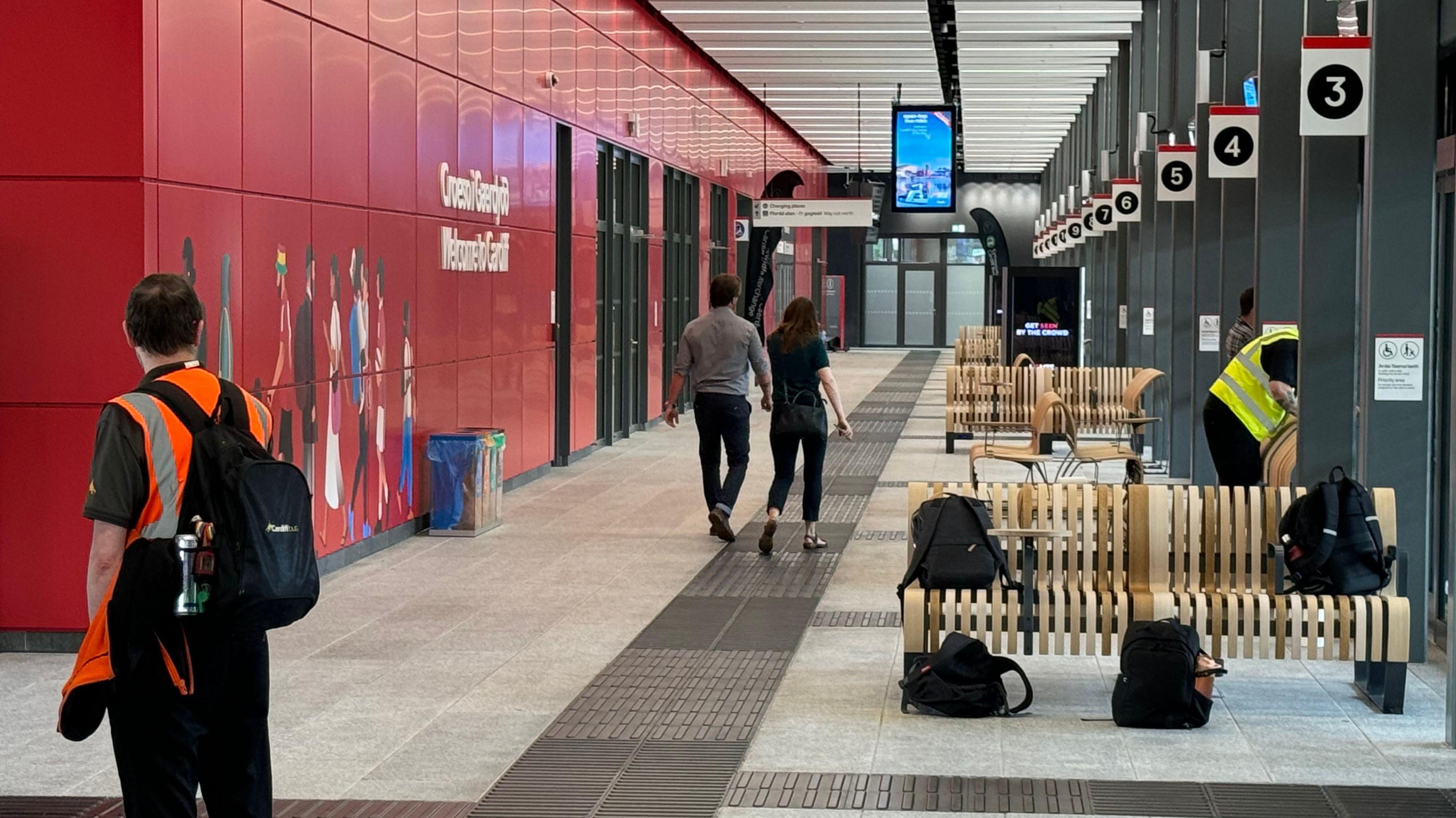 The new bus station inside including benches and information screens