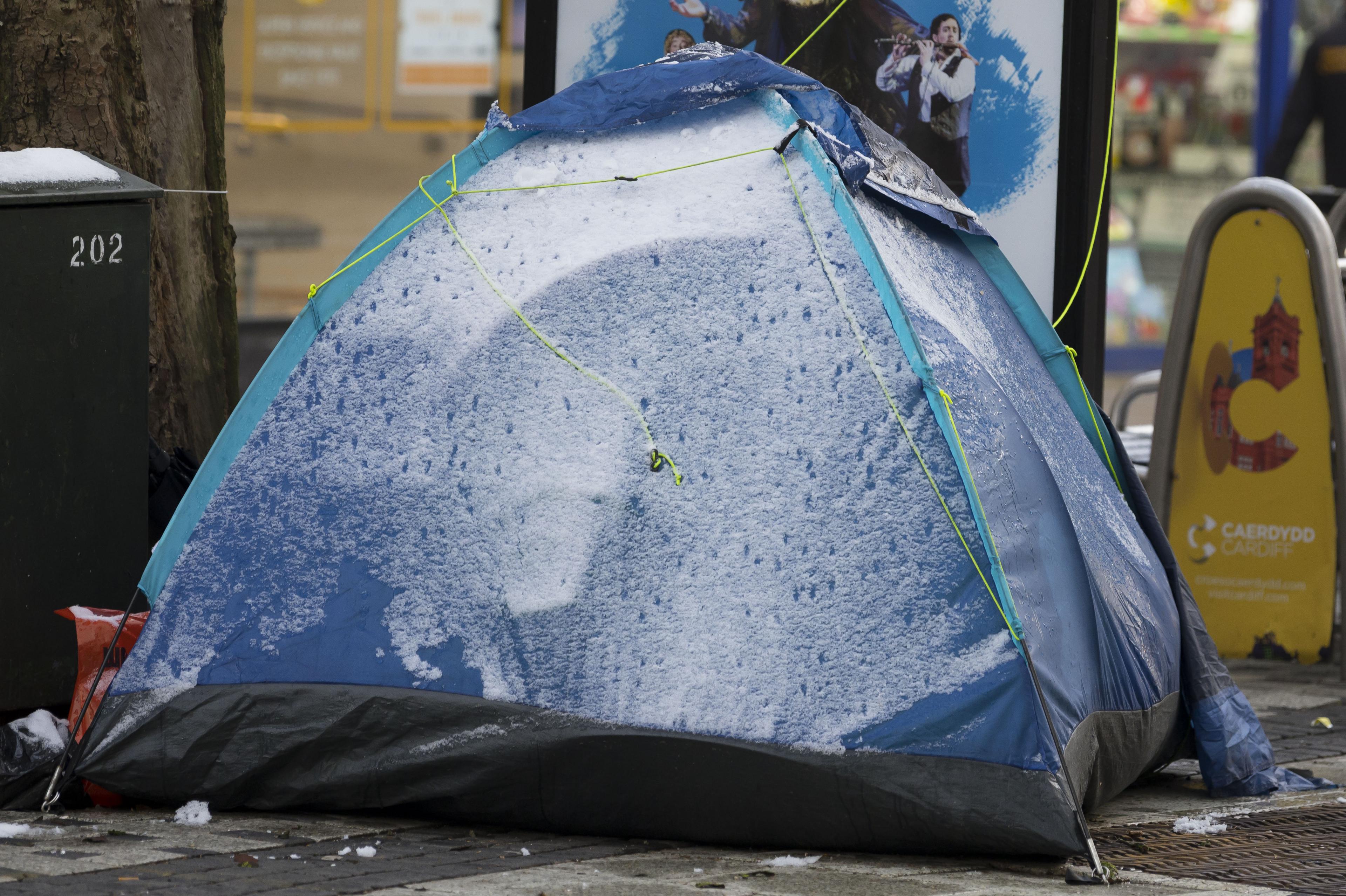 A snow-covered tent in Cardiff's Queen Street.