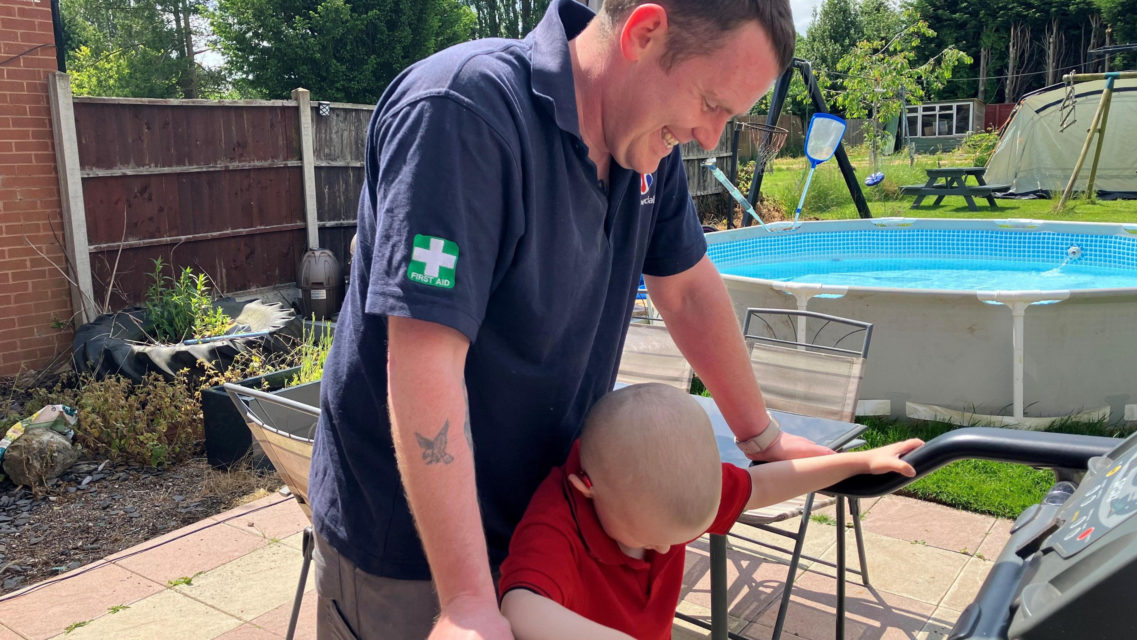 Jack with his father in the garden