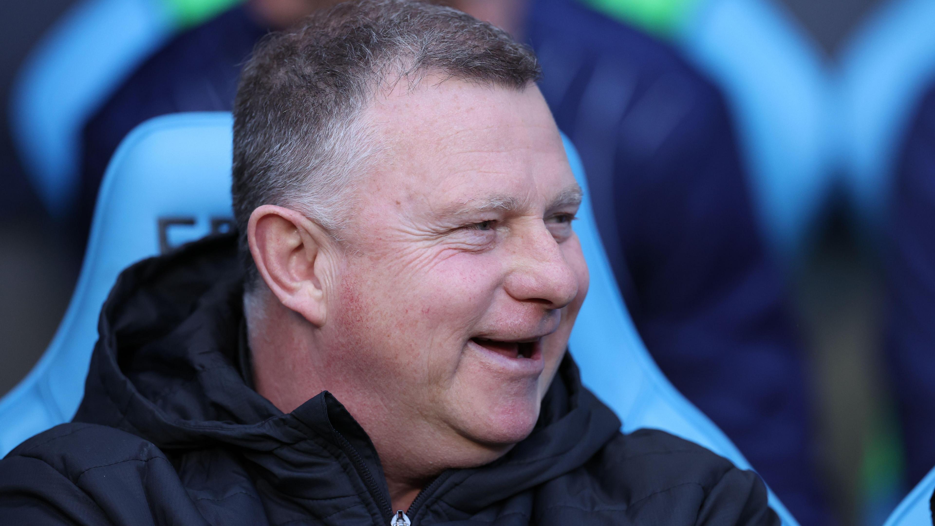 Mark Robins smiling