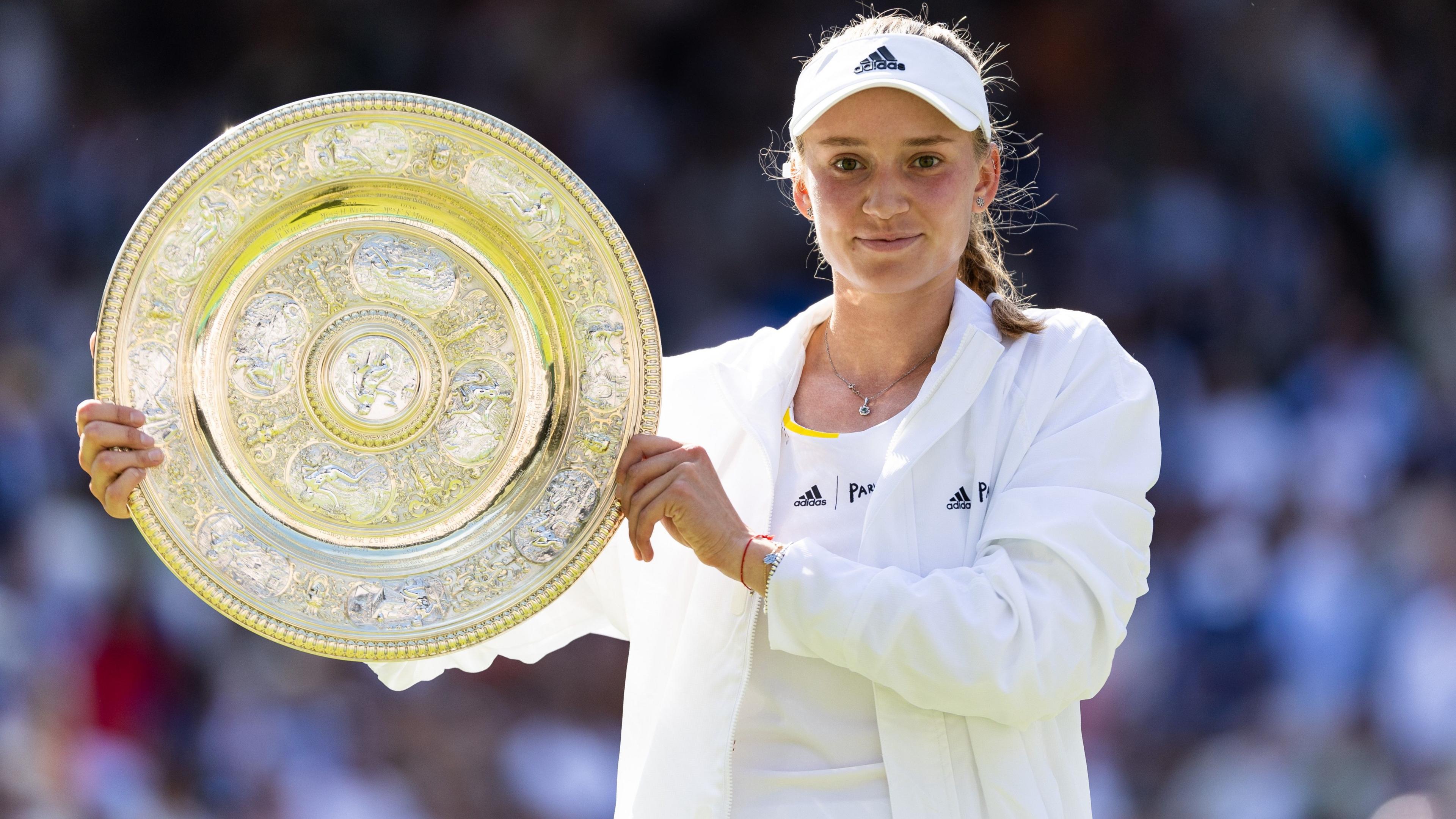 Elena Rybakina with the Wimbledon trophy in 2023