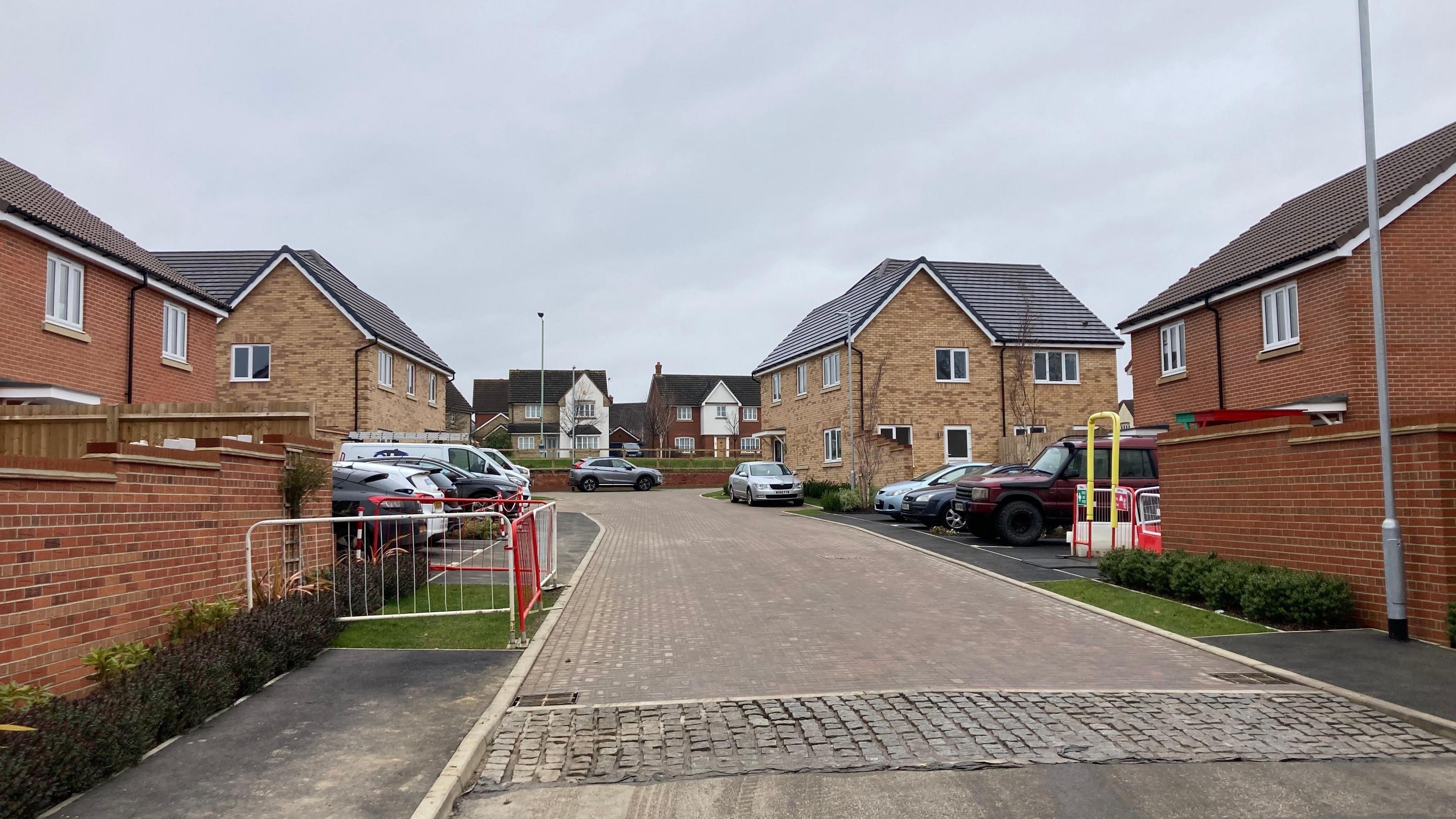 A general view of Leveret Gardens in Stowmarket. Cars can be seen parked outside homes.