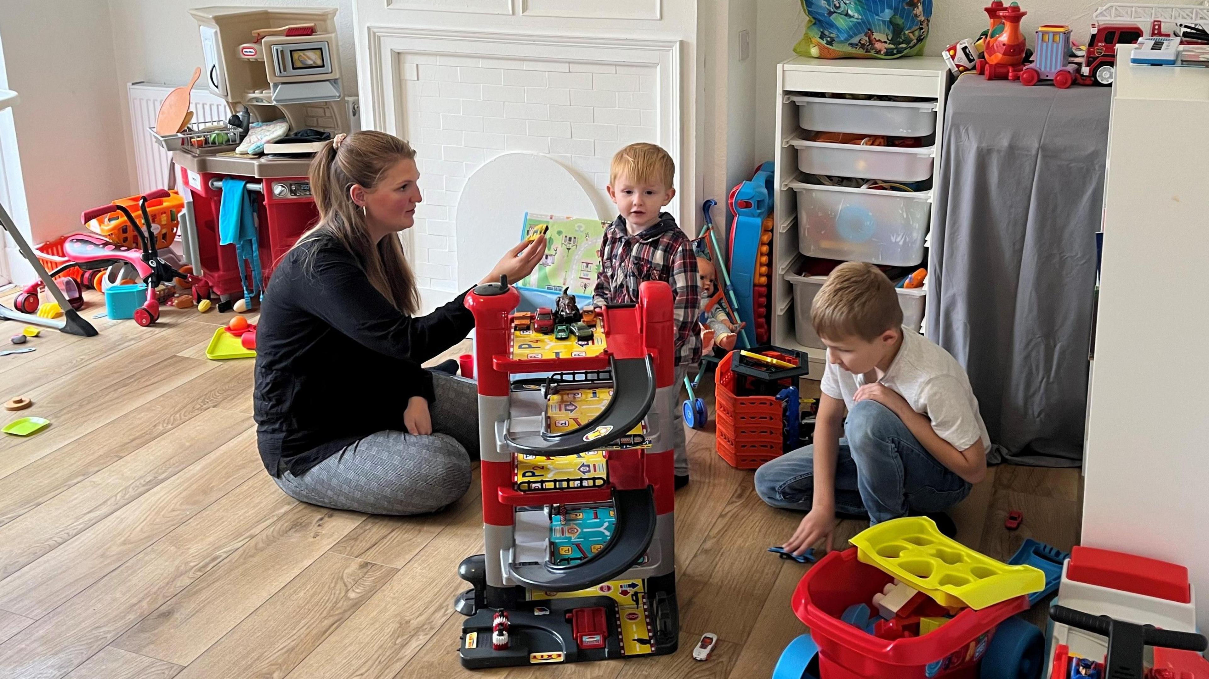 Harlie with her two boys who live in temporary housing in south London