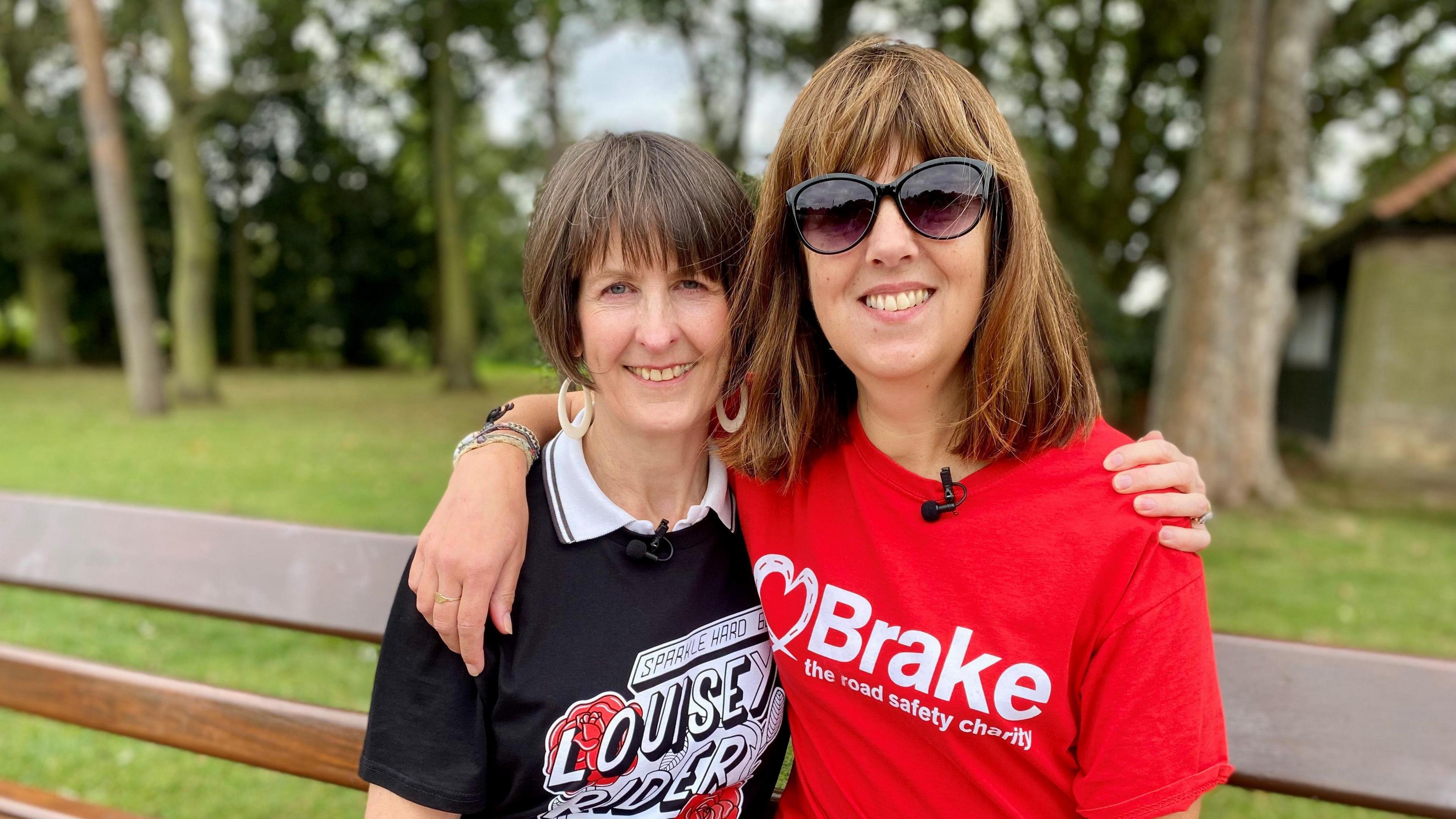 Ms Wright's mum Sharon Brown is hugging Coleen Coxon