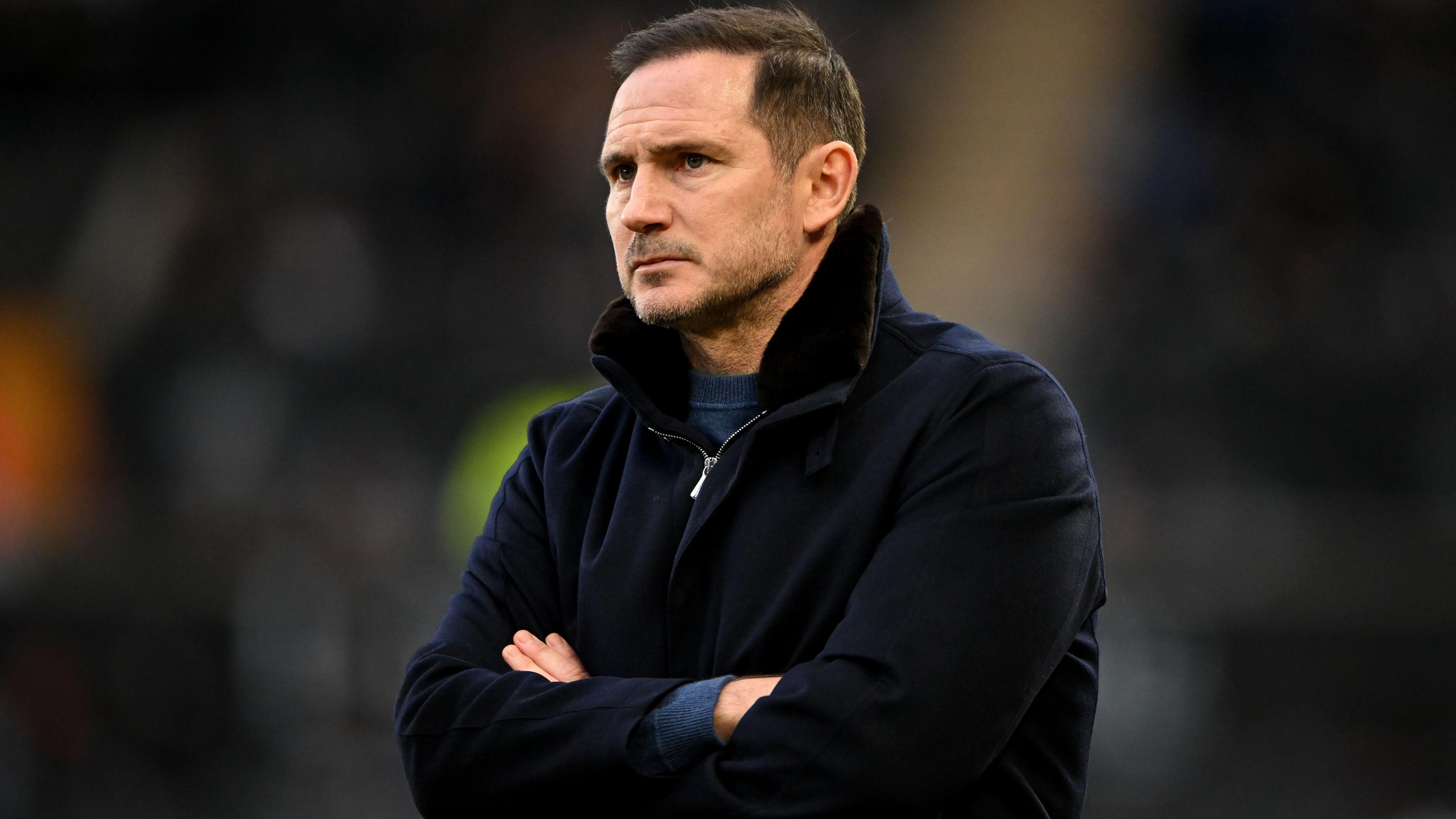 Frank Lampard on the touchline with arms folded