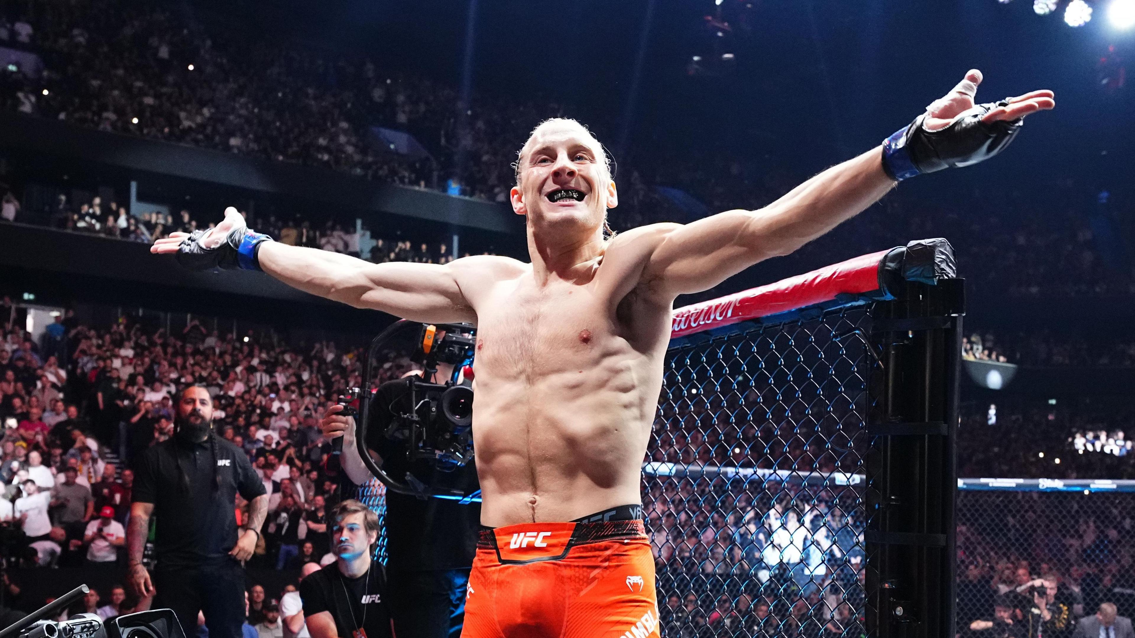 Paddy Pimblett celebrates beating Michael Chandler in April