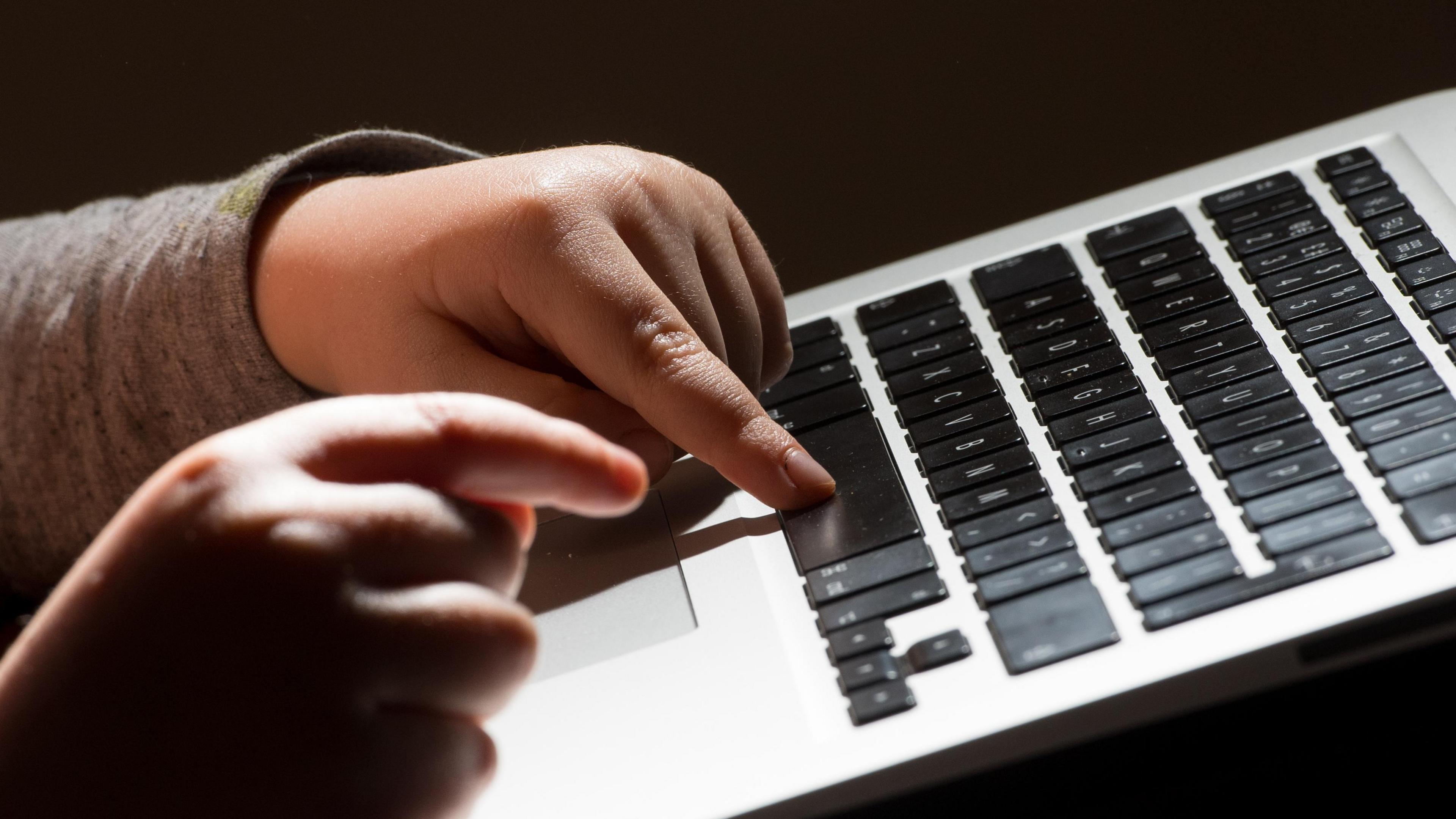 Child using a computer