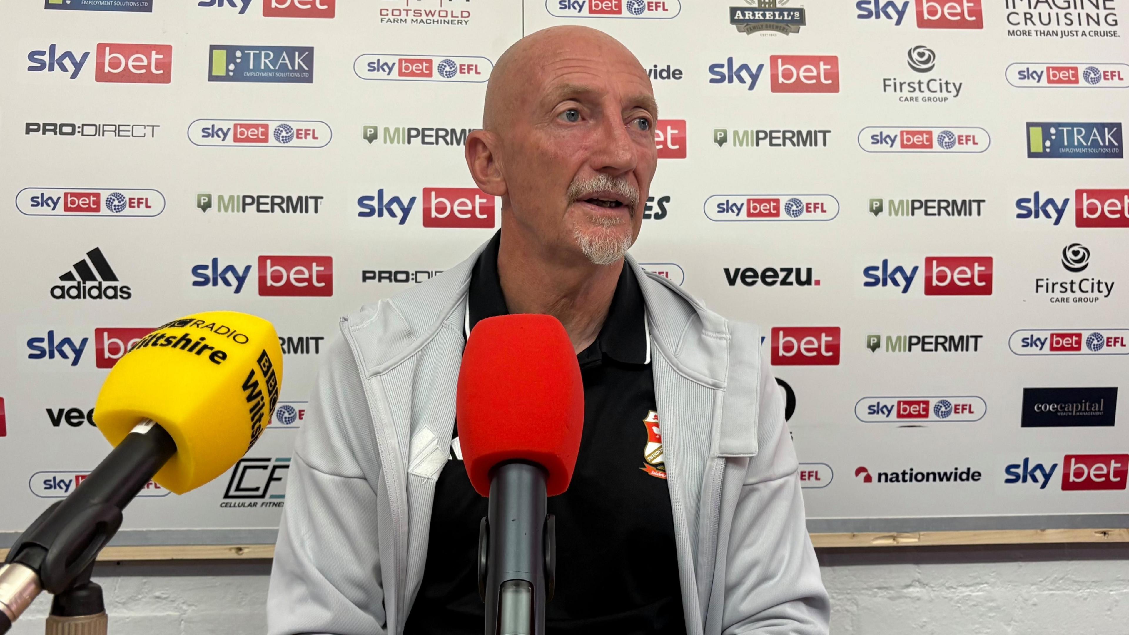 Ian Holloway at a media conference