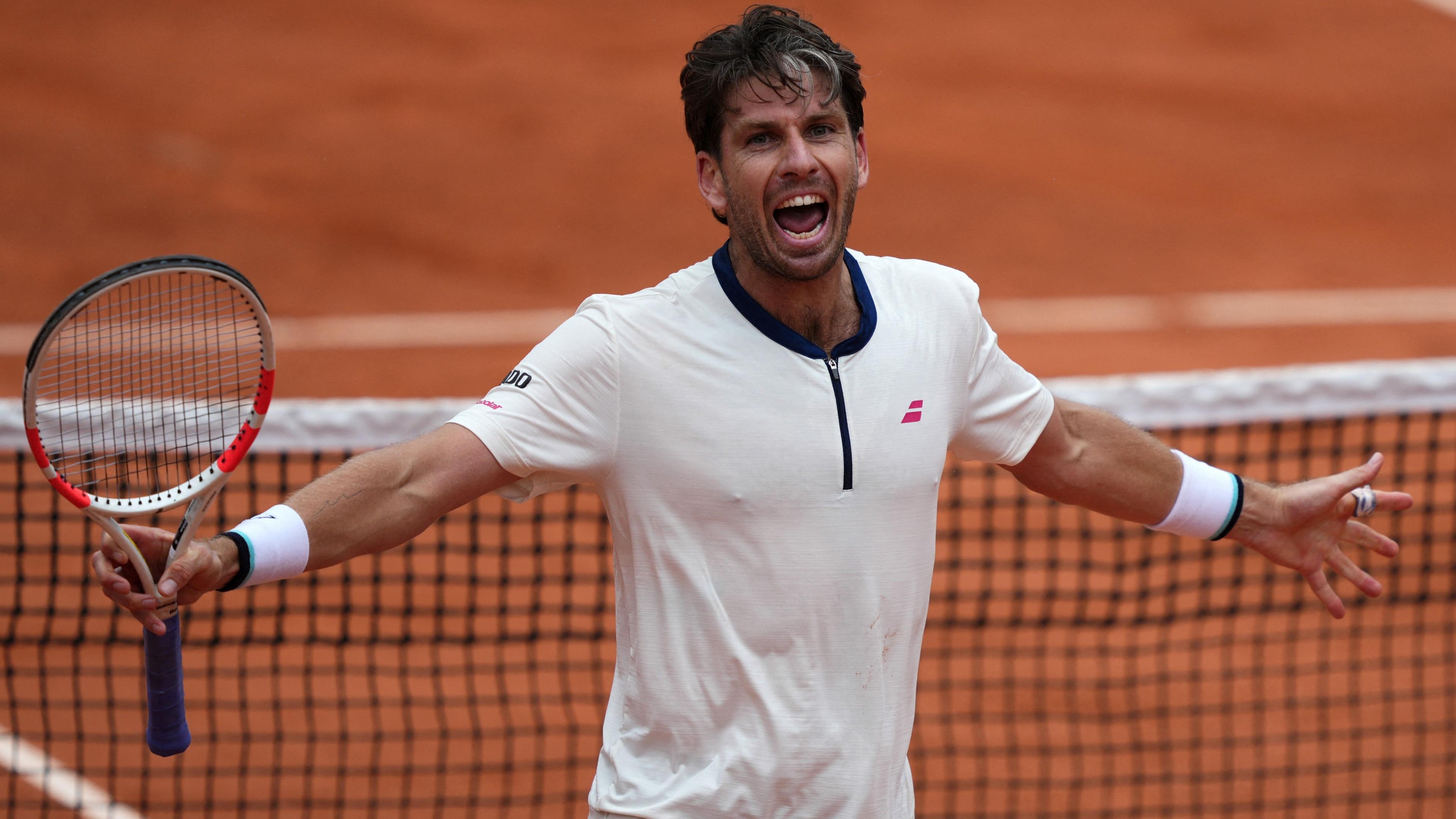 Cameron Norrie celebrates victory over Daniil Medvedev at the French Open