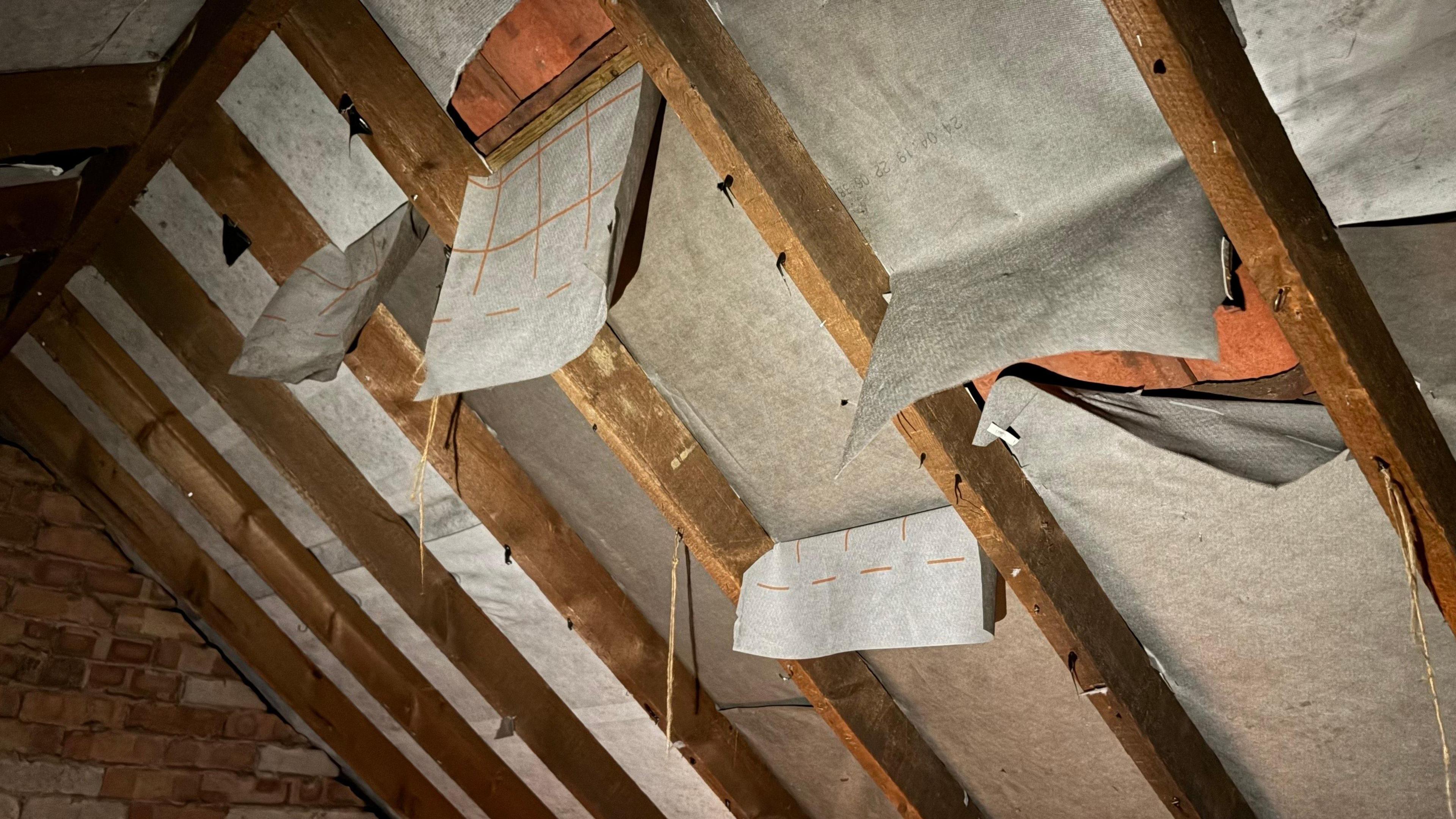 Rope hanging from the inside of an attic