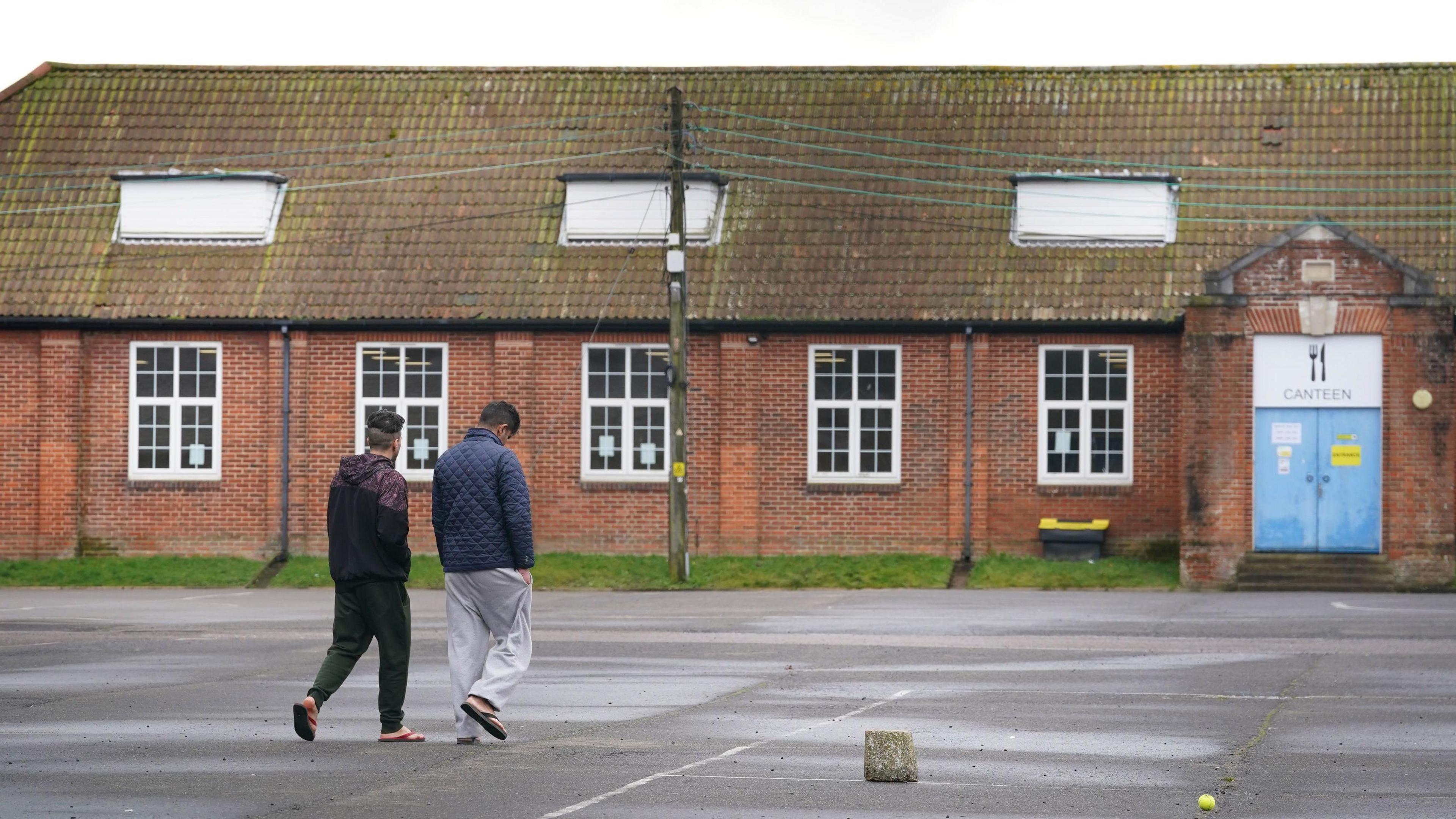 Migrants housed at Napier Barracks in Folkestone, Kent