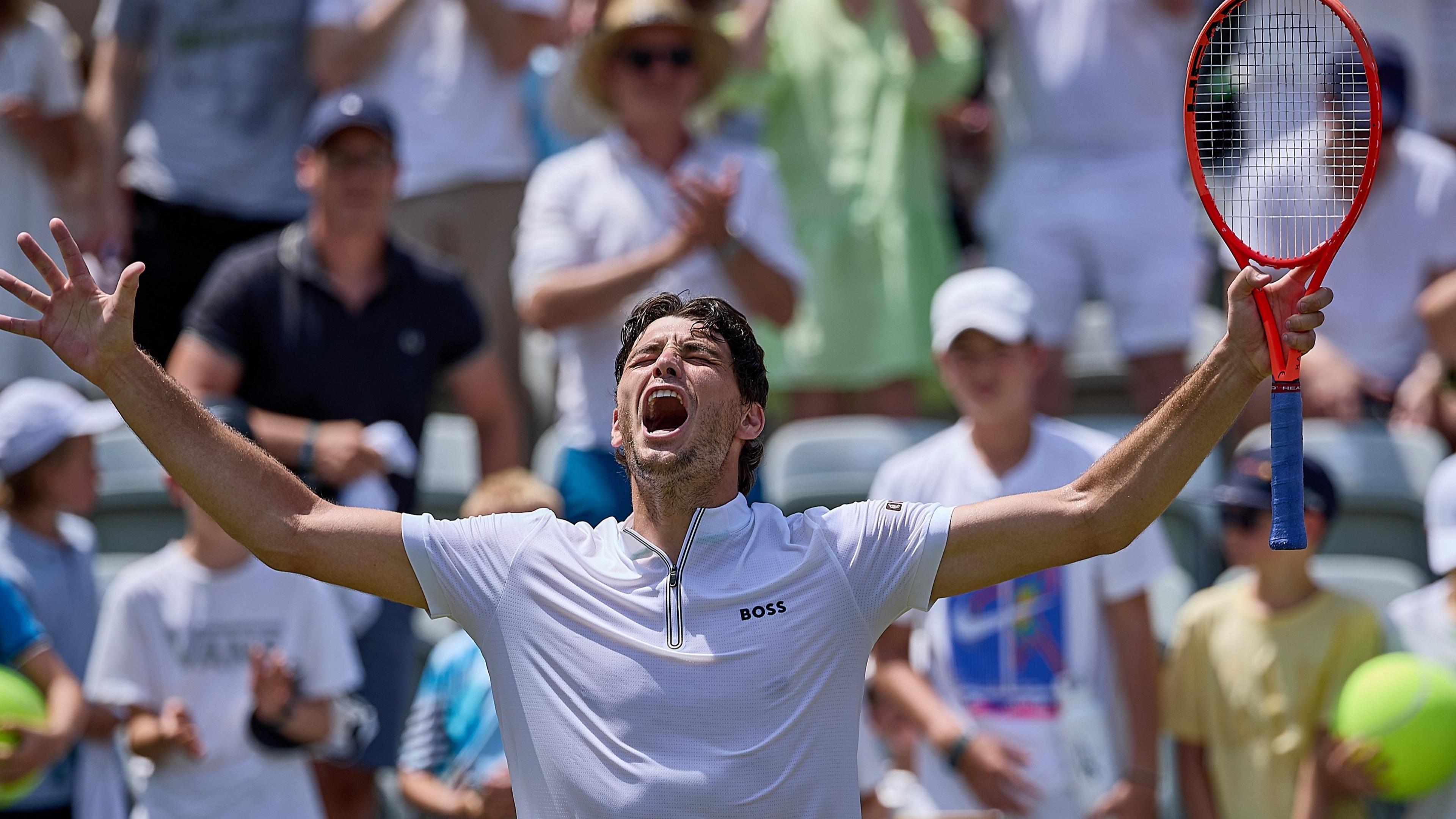 Taylor Fritz celebrates victory at the Stuttgart Open