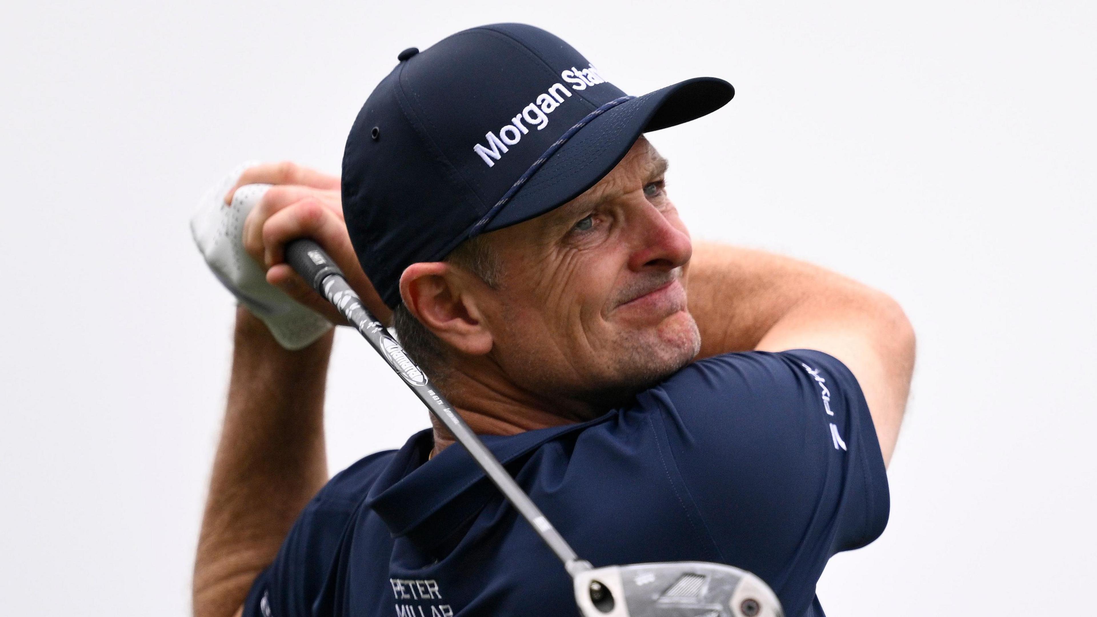Justin Rose plays a shot