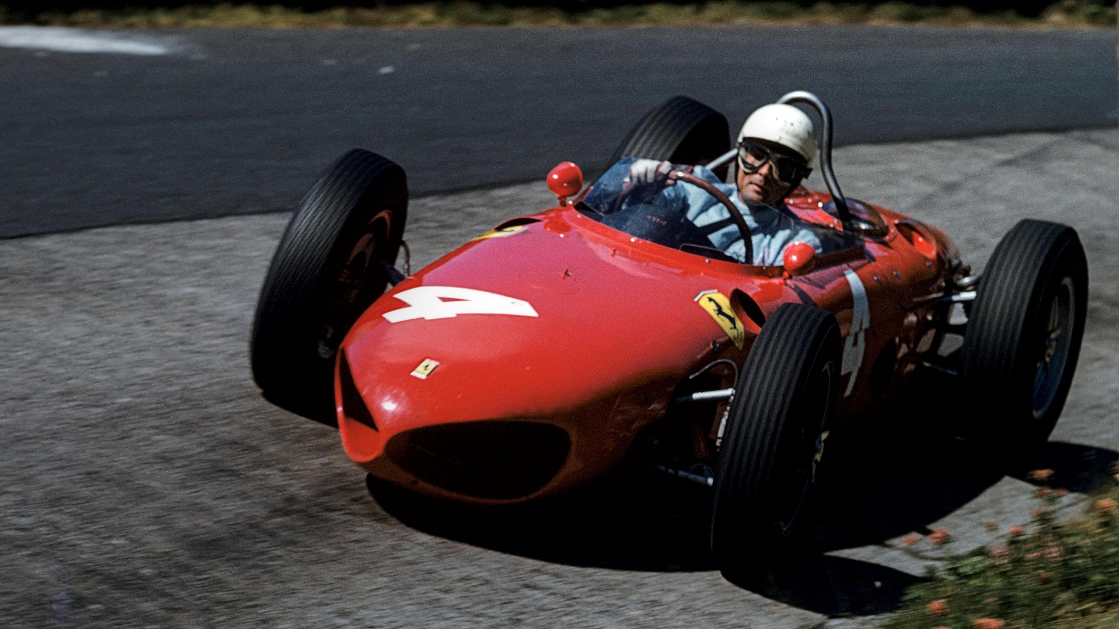 Phil Hill driving the 'sharknose' Ferrari during the 1961 German Grand Prix at the Nurburgring