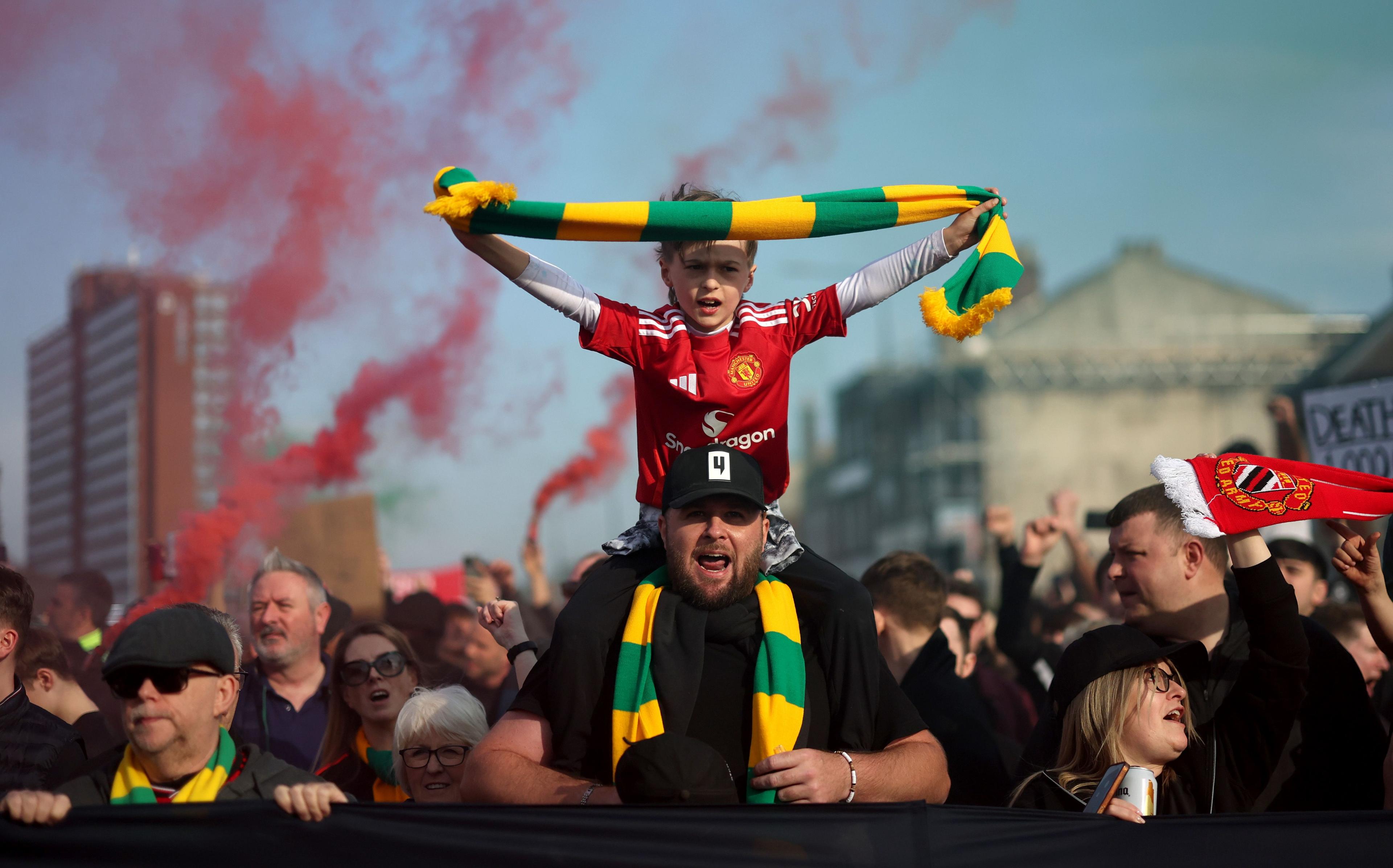 Manchester United fans protest the Glazer ownership outside the stadium prior to the Premier League match between Manchester United and Arsenal at Old Trafford