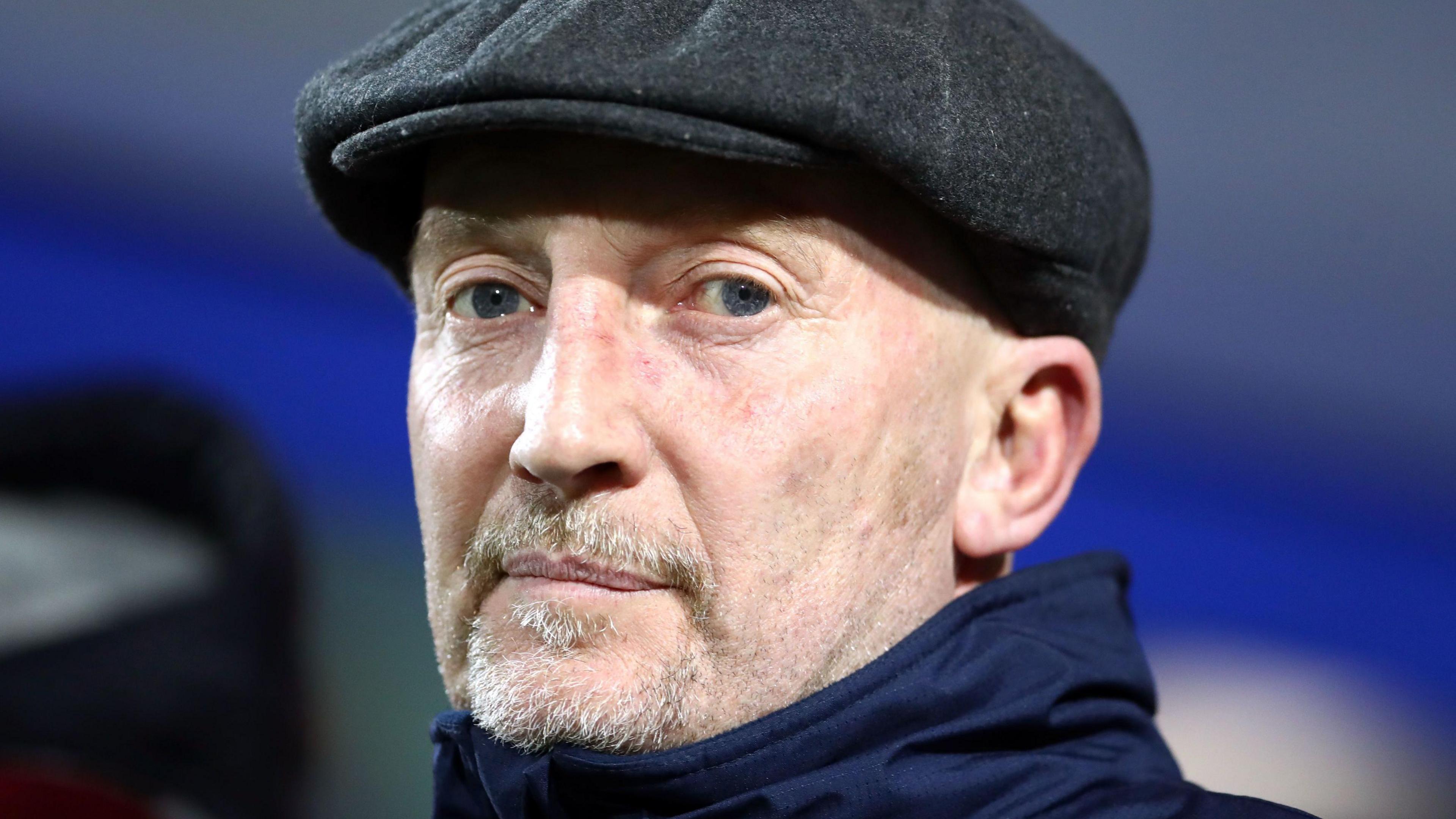 Swindon Town manager Ian Holloway looks directly at the camera