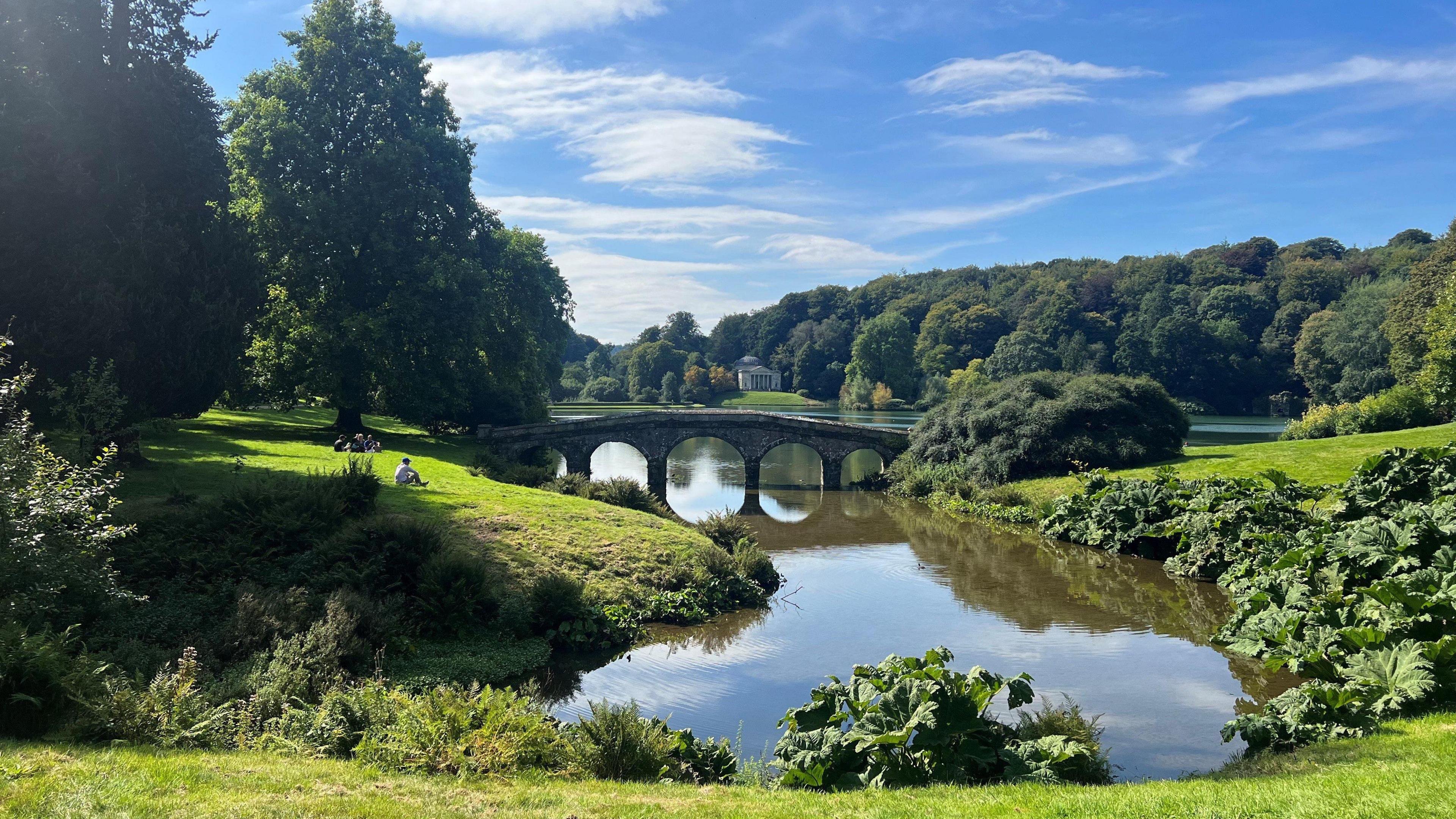 Beautiful picture of blue sky and bridge in front of lake