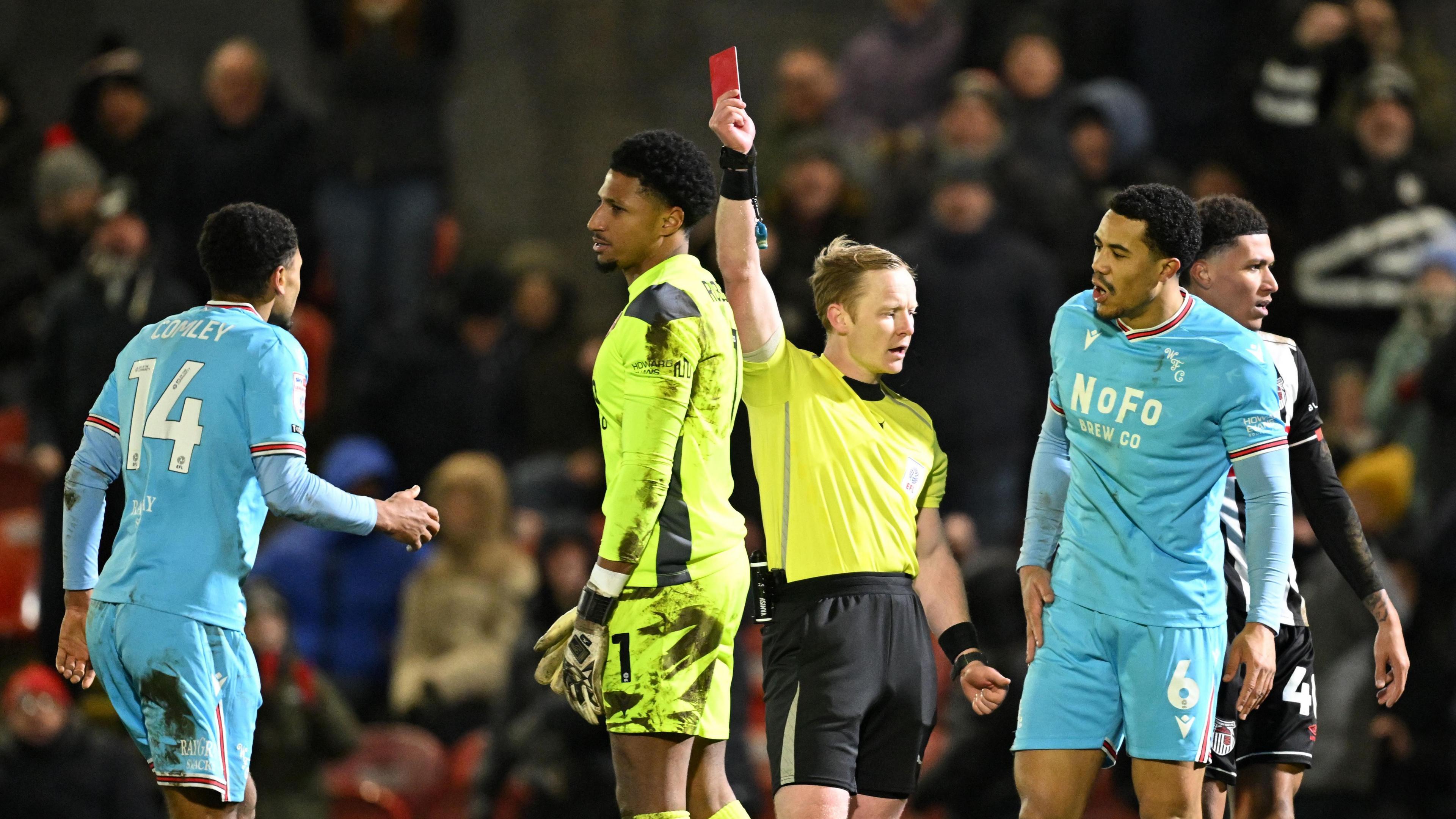 Myles Roberts is shown a red card