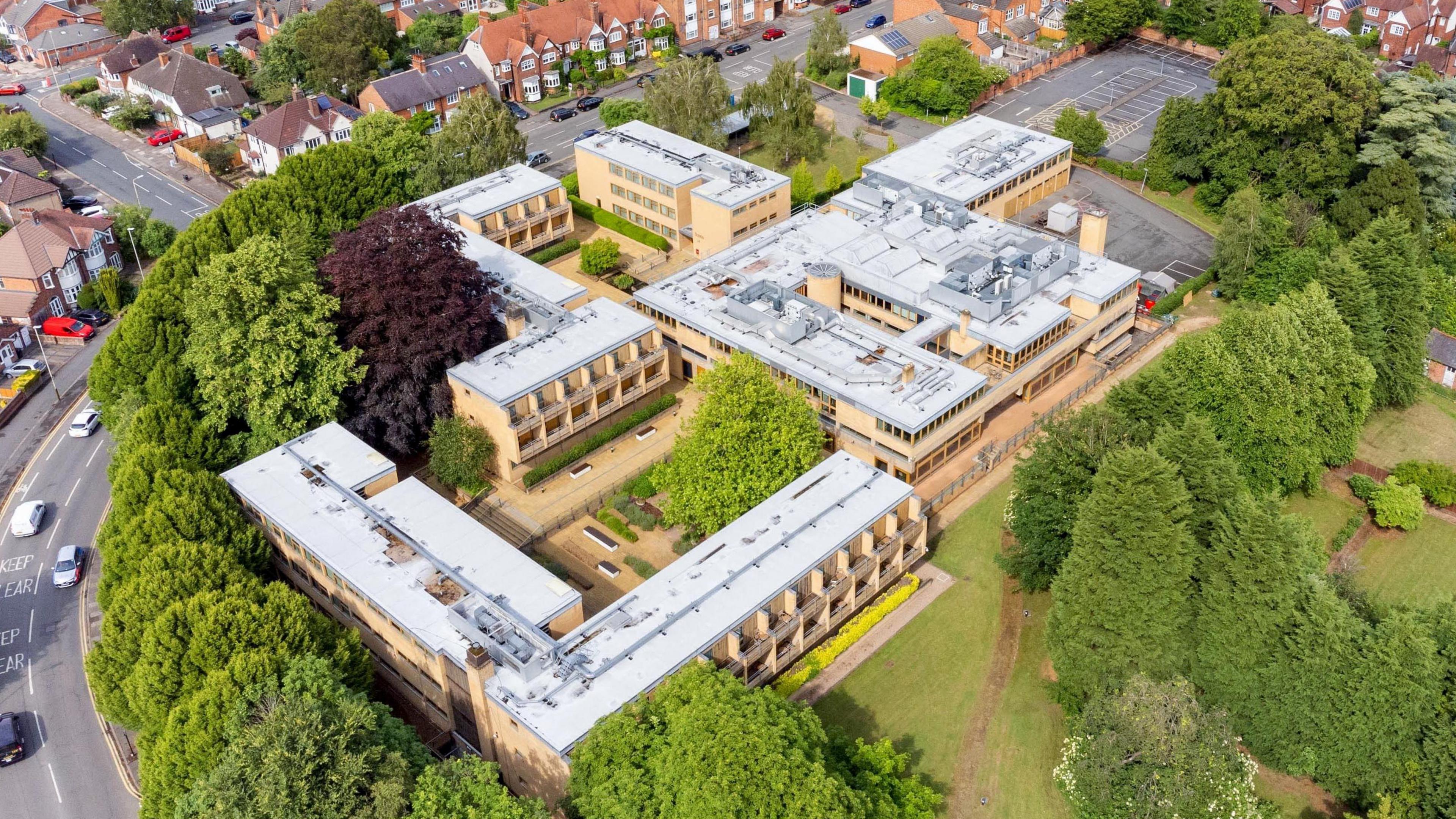 College Court from above with trees surrounding the complex