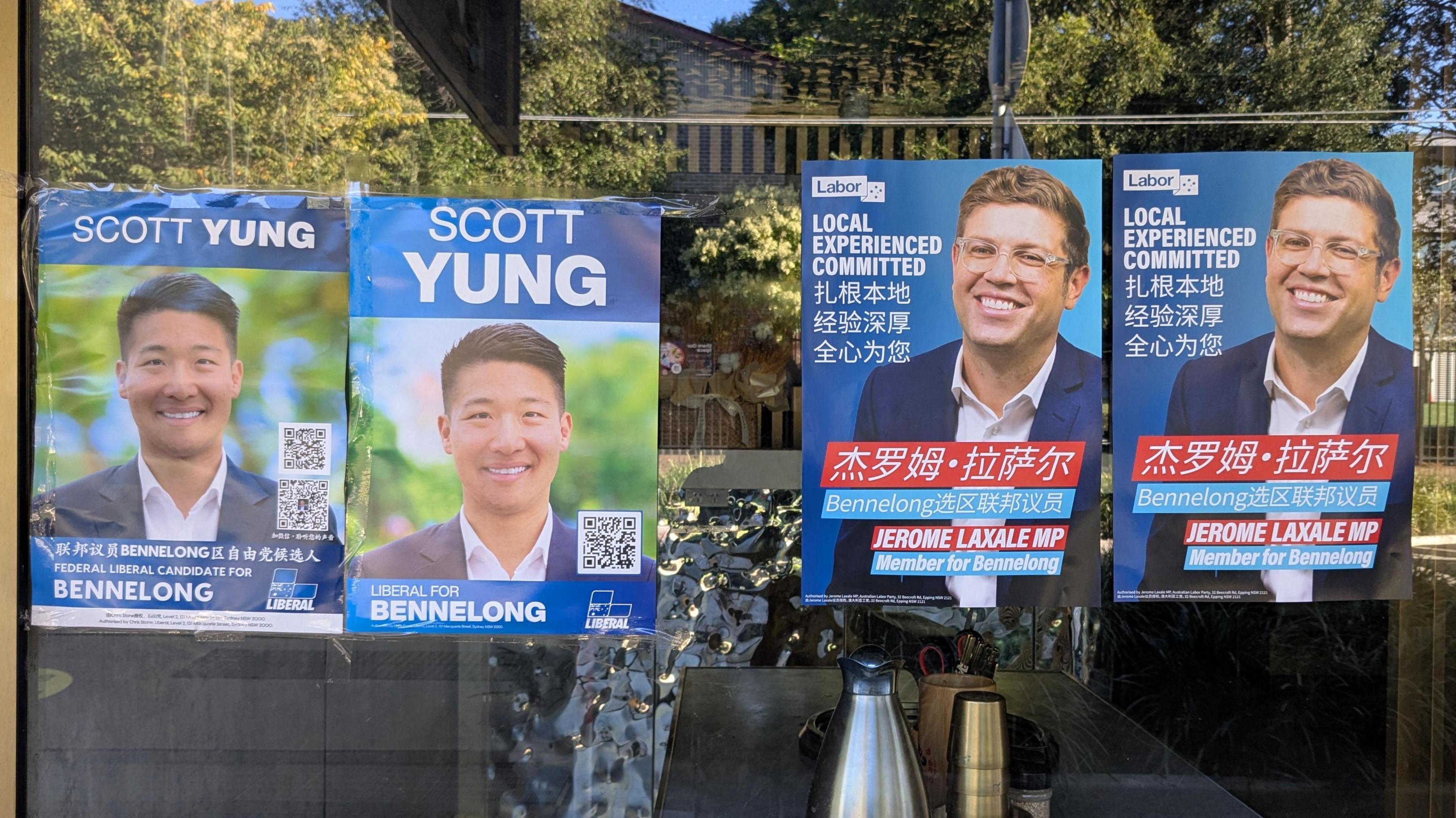 Campaign posters of Scott Yung and Jerome Laxale seen outside a restaurant in Bennelong, NSW