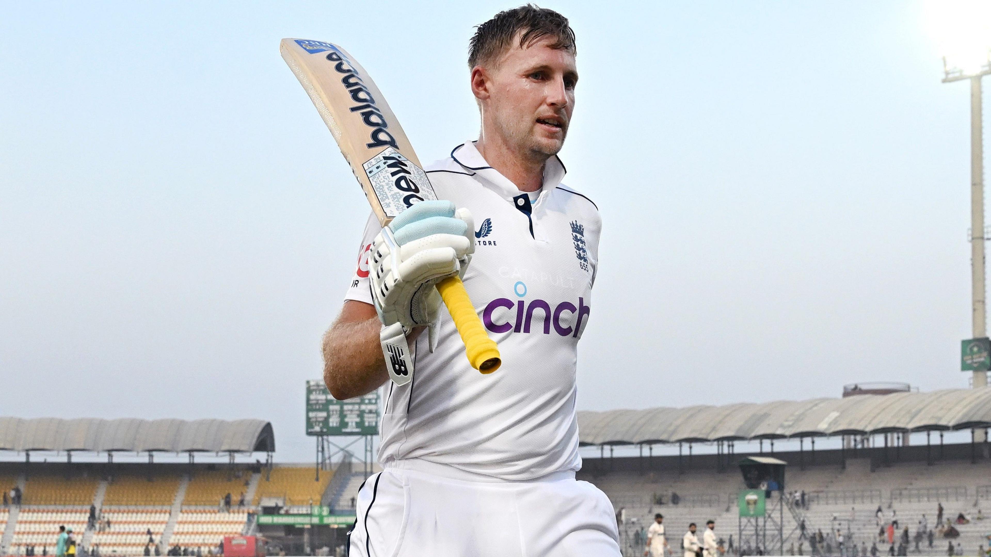 Joe Root raises his bat