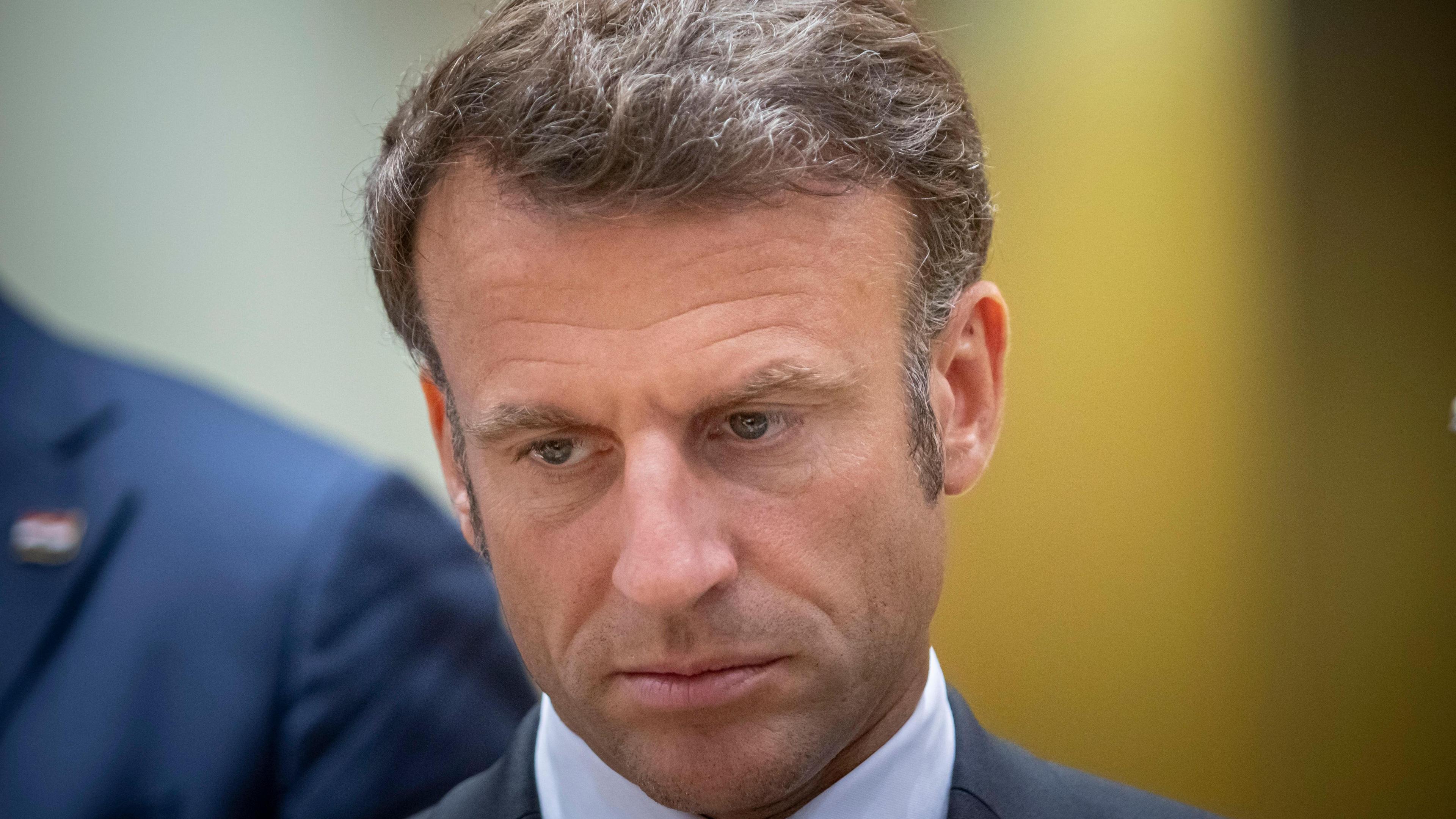 Emmanuel Macron looking sad