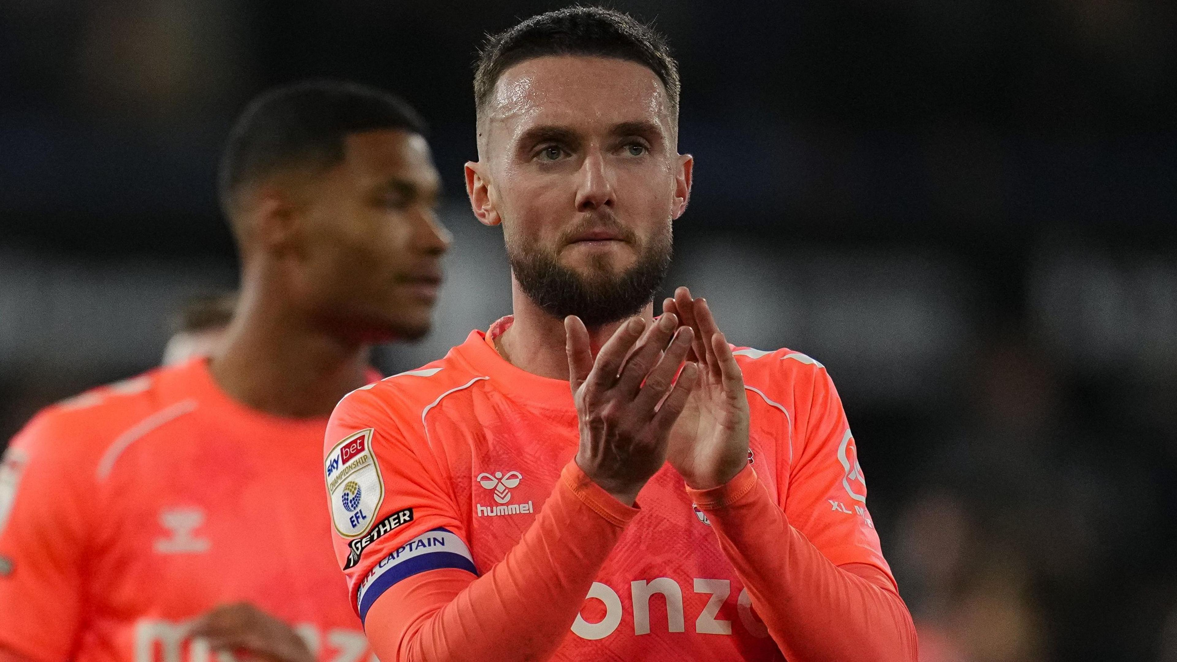 Coventry City captain Matt Grimes applauds the travelling fans after the 3-0 loss at Ipswich