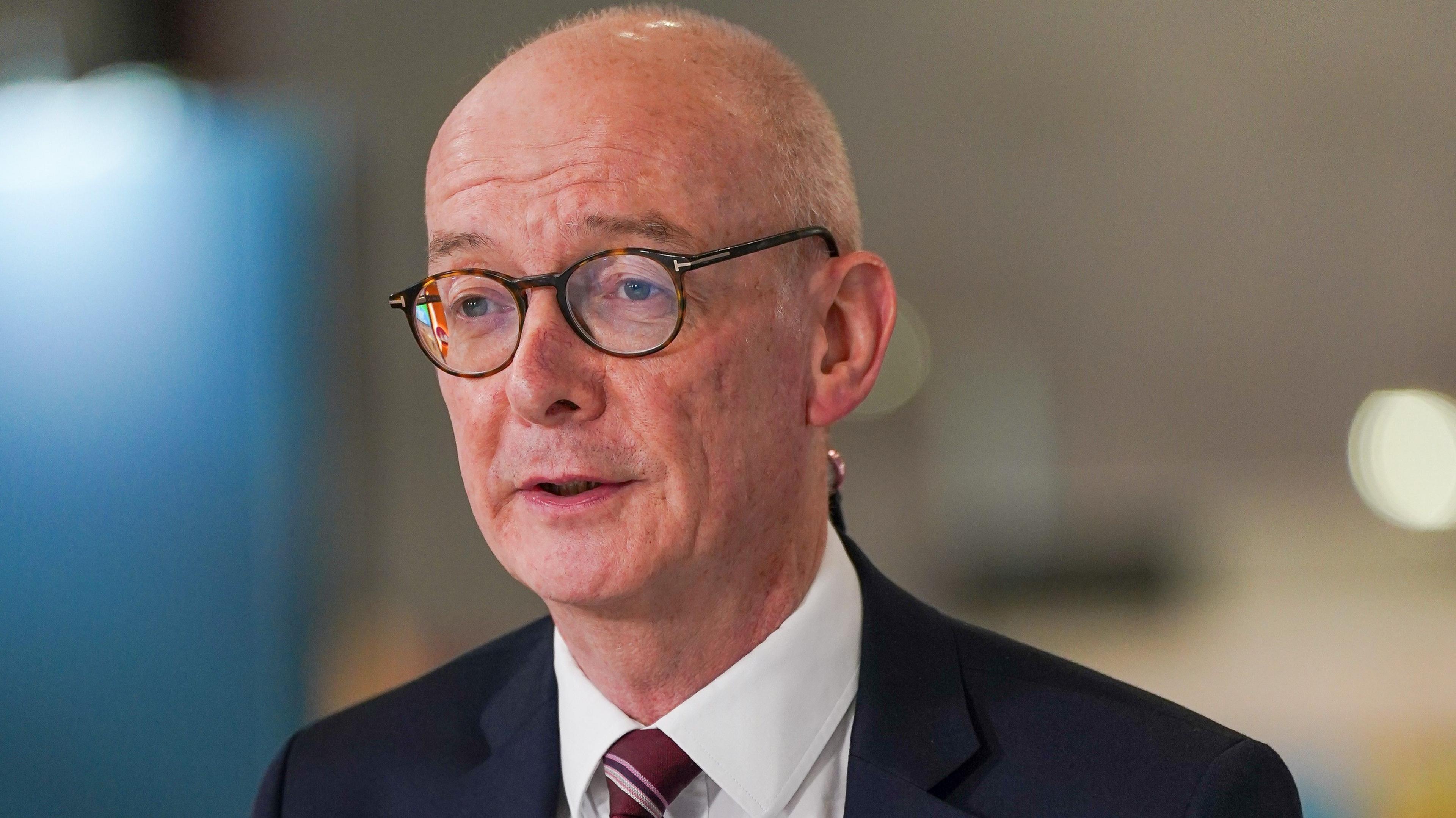 Chancellor of the Duchy of Lancaster Pat McFadden looks forward while wearing glasses