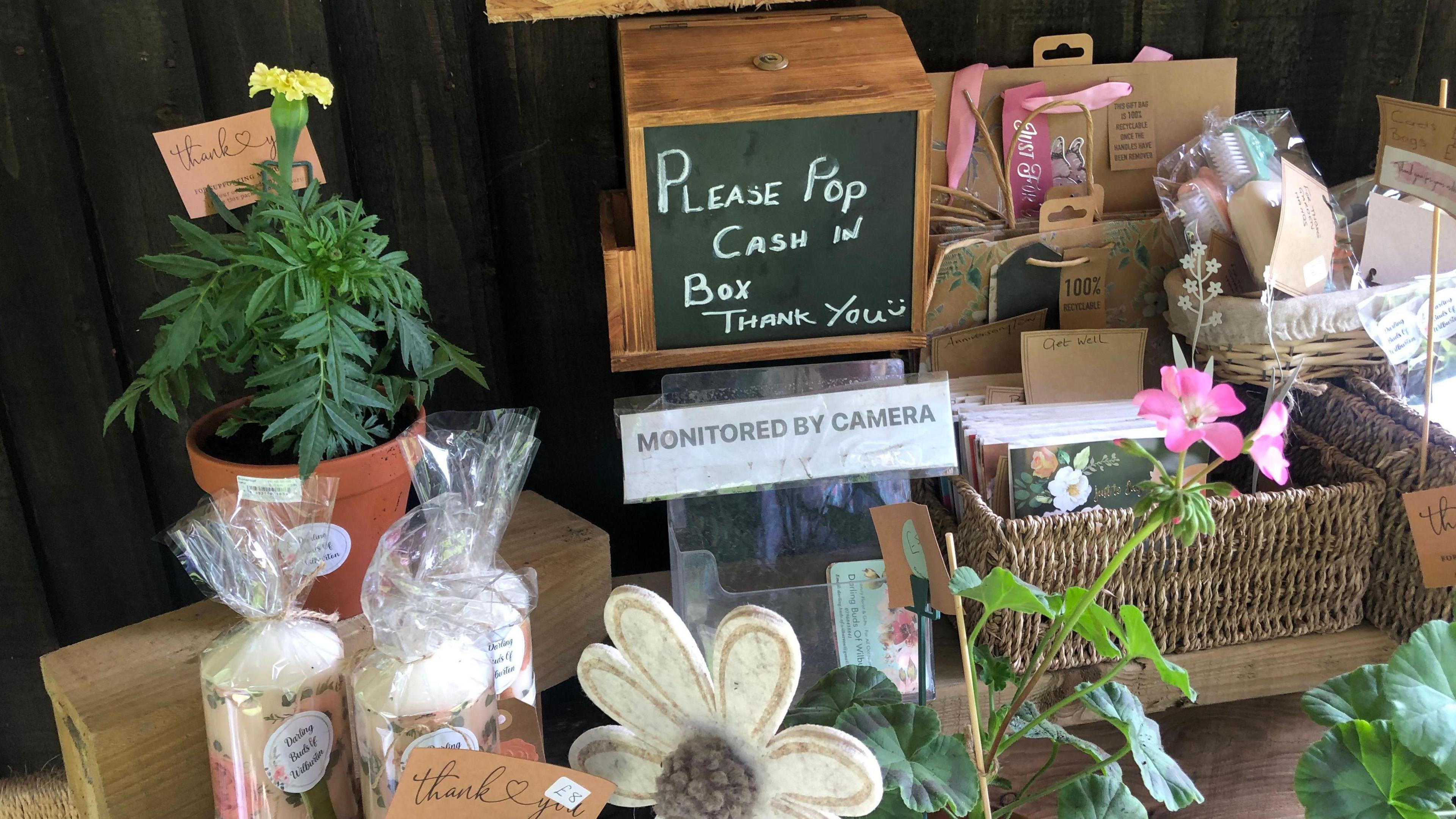 The flower stall with an honesty box for cash payments