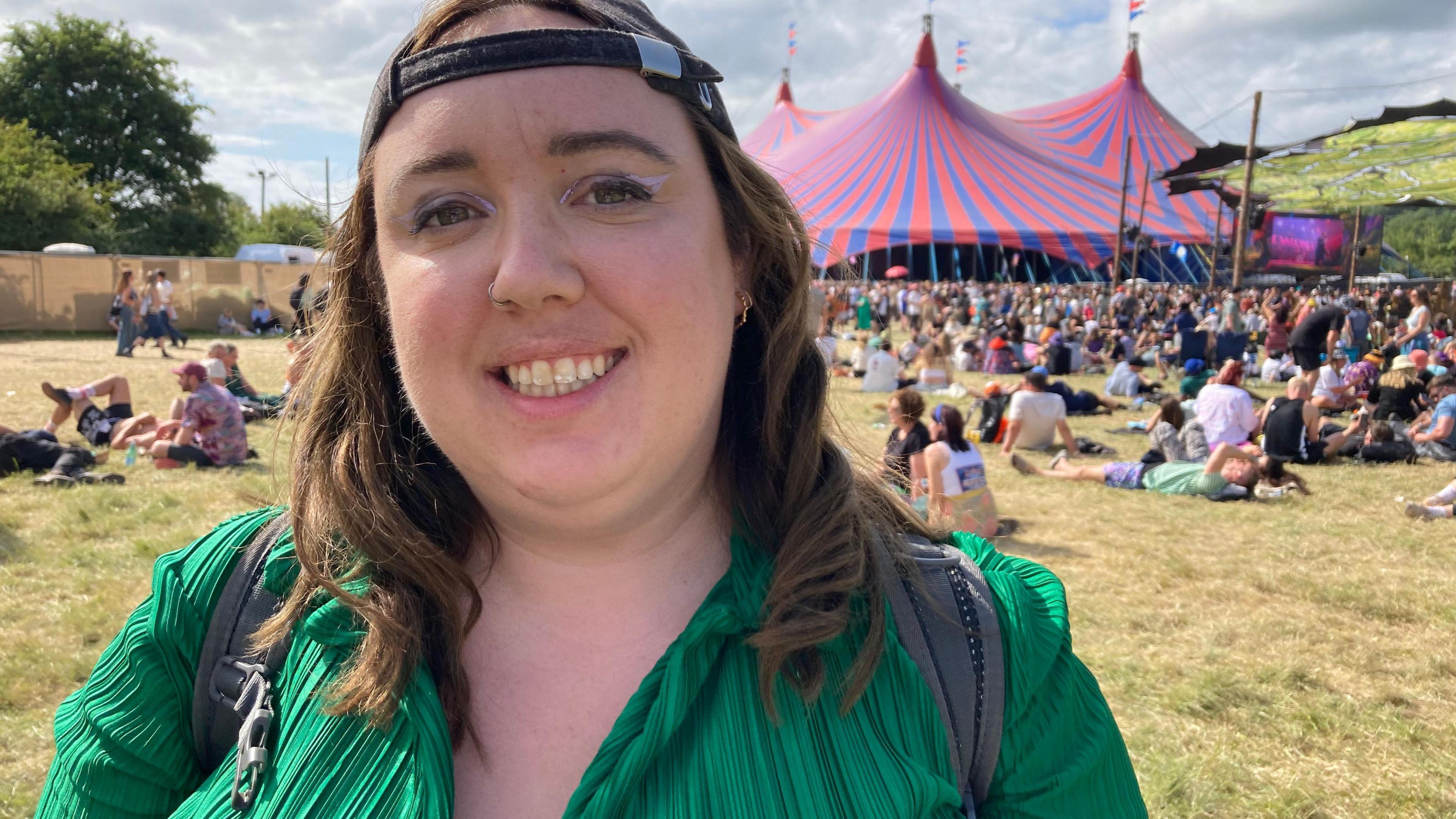 Hatty Grant standing in a field at Glastonbury