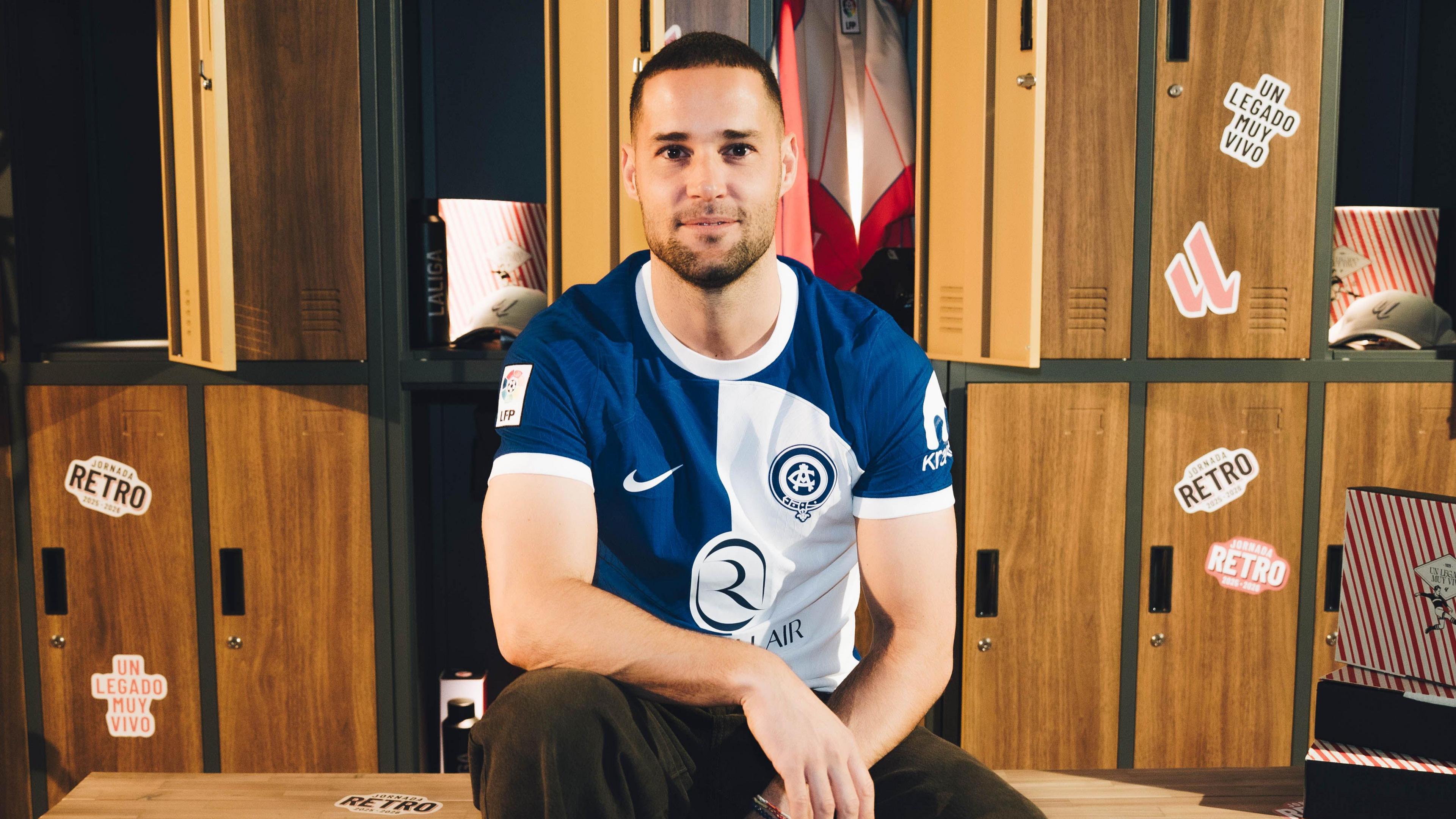 Model wearing Atletico Madrid retro kit at Madrid Fashion Week