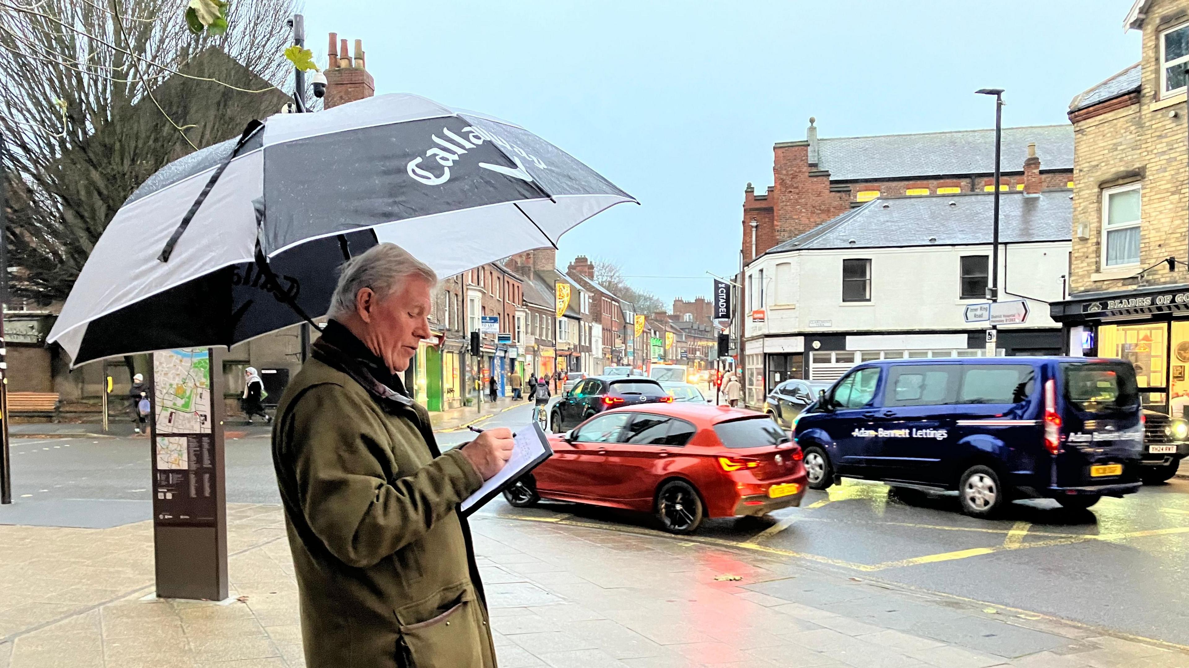 Brendan Hopkins from the Gillygate Air Quality Action Group monitoring traffic on Gillygate