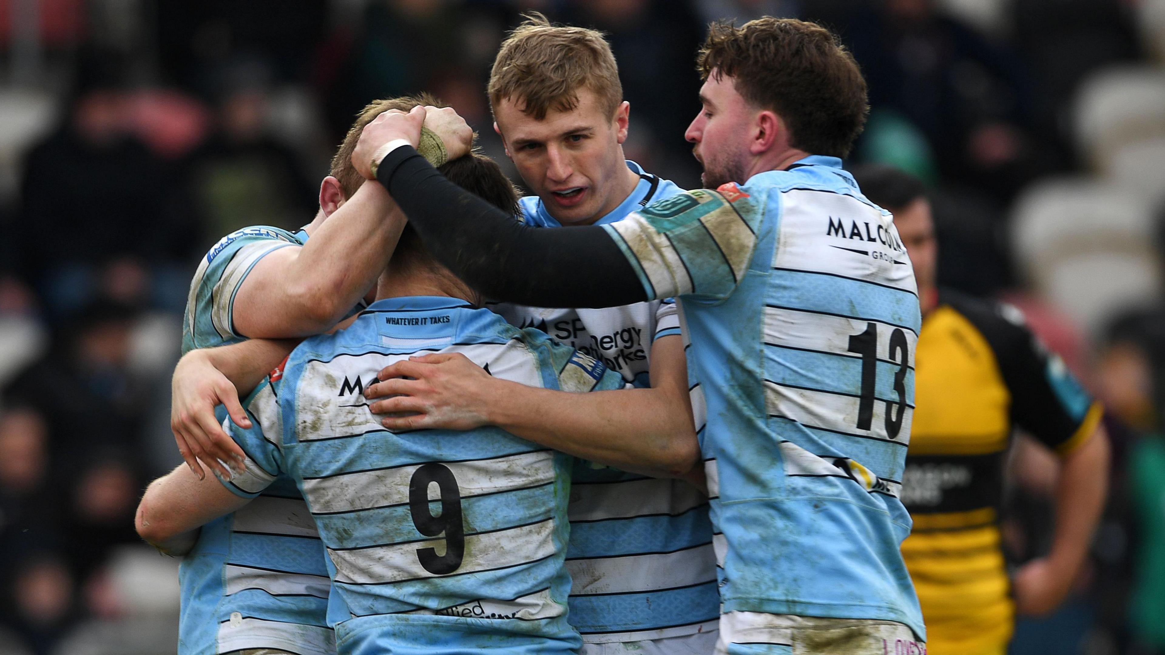 Glasgow players celebrate try