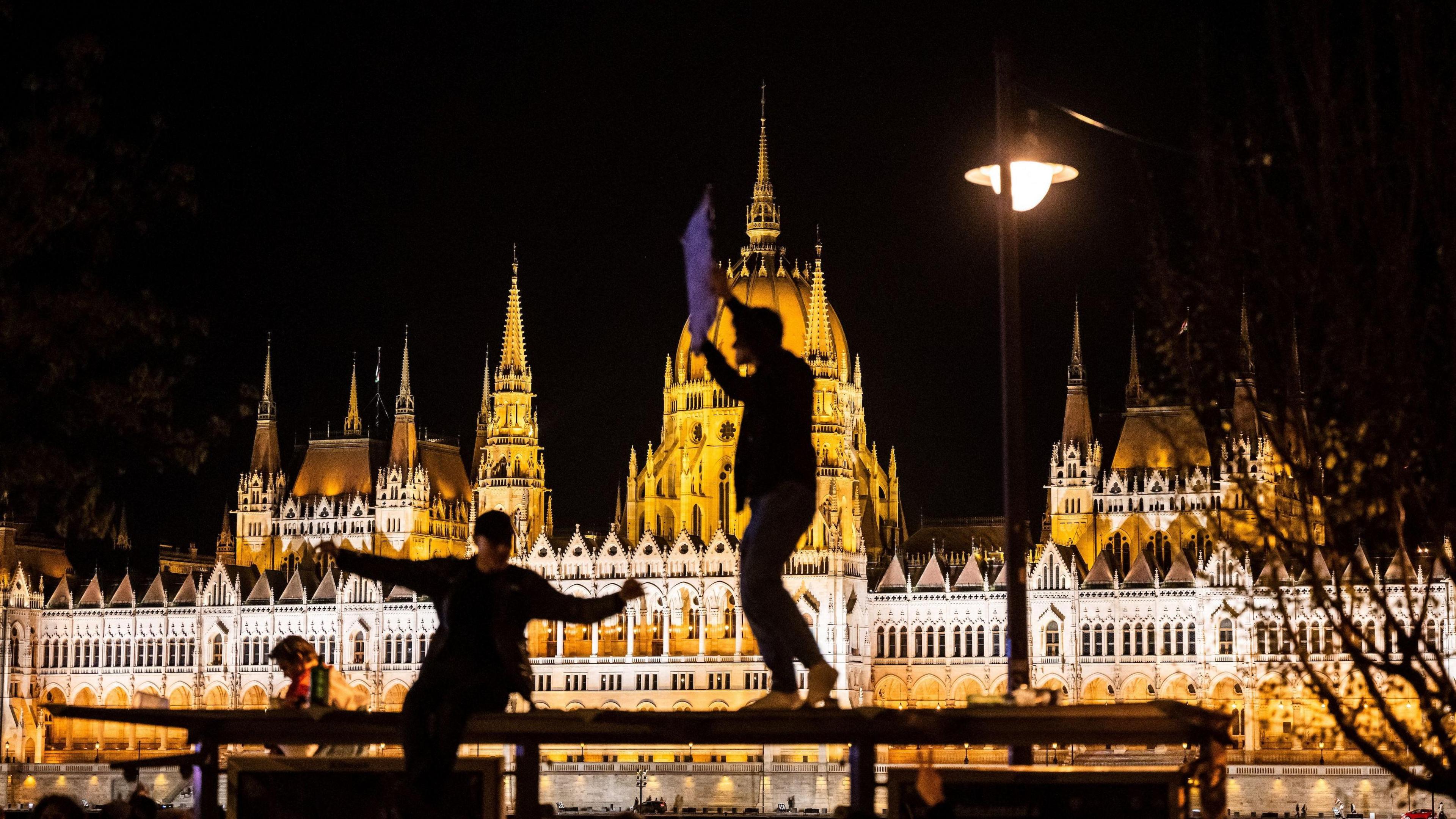 People celebrate after the Tisza Party wins the Hungarian parliamentary election in Budapest