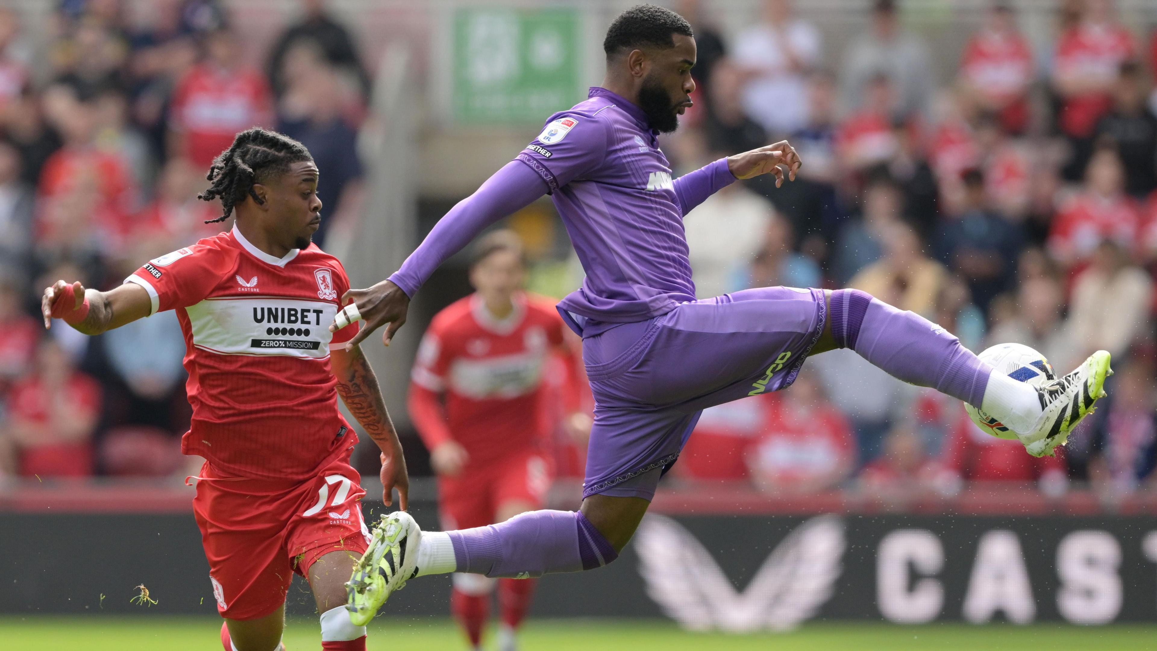 Japhet Tanganga acrobatically controls the ball against Middlesbrough
