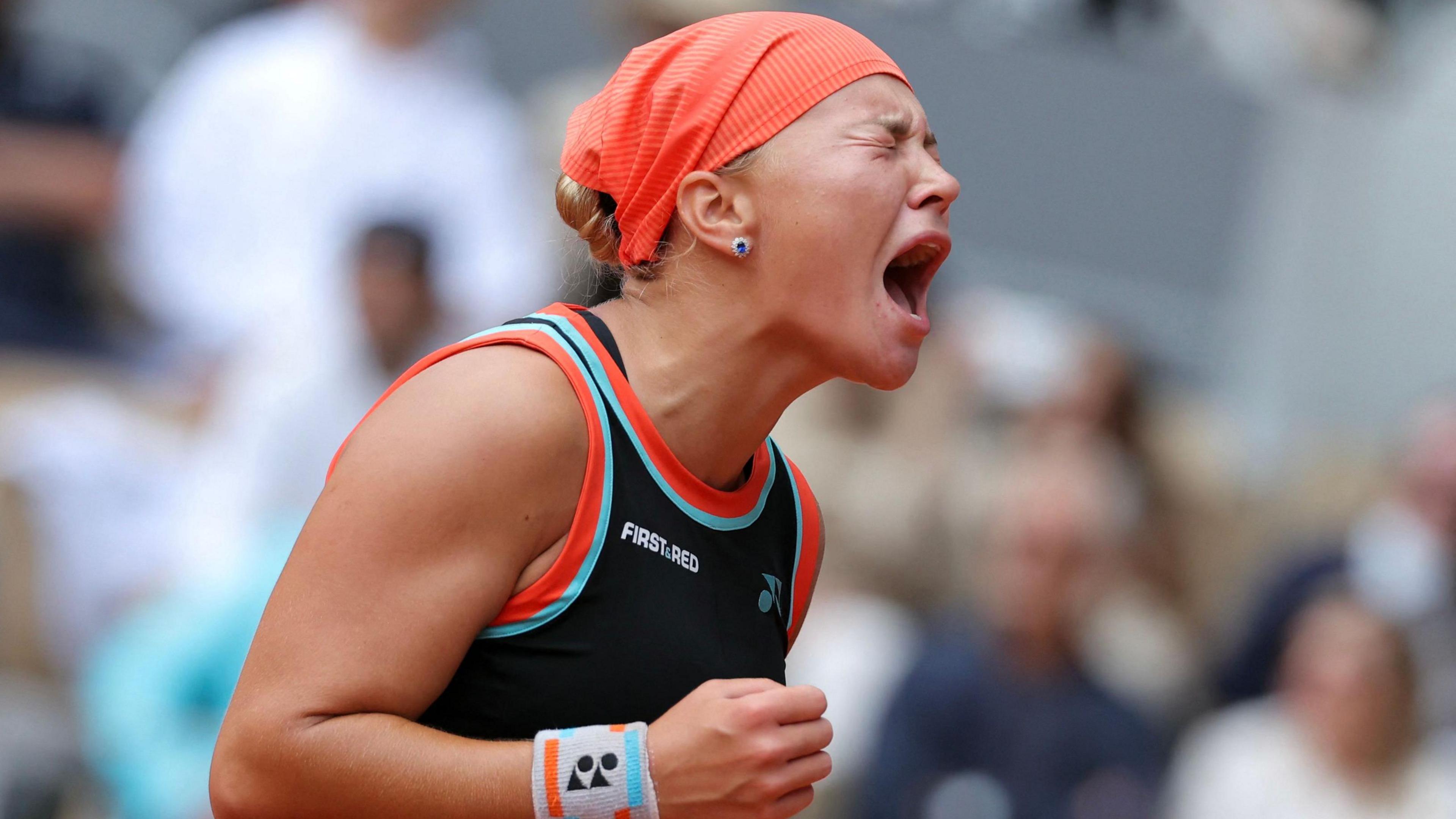Diana Shnaider celebrates beating Aryna Sabalenka at the 2026 French Open