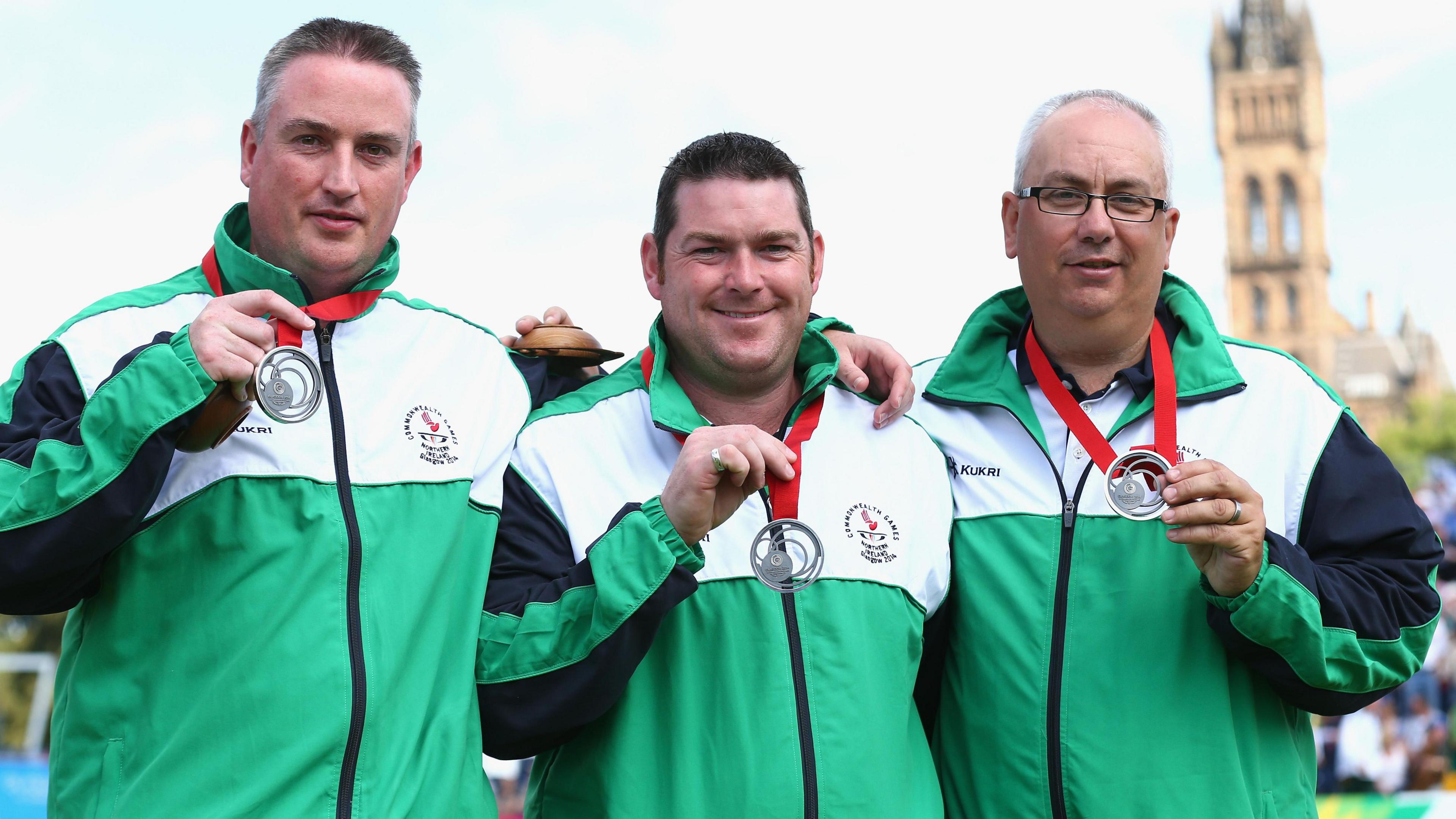 Neil Booth and his Northern Ireland team-mates show off their silver medals at the 2014 Commonwealth Games in Glasgow