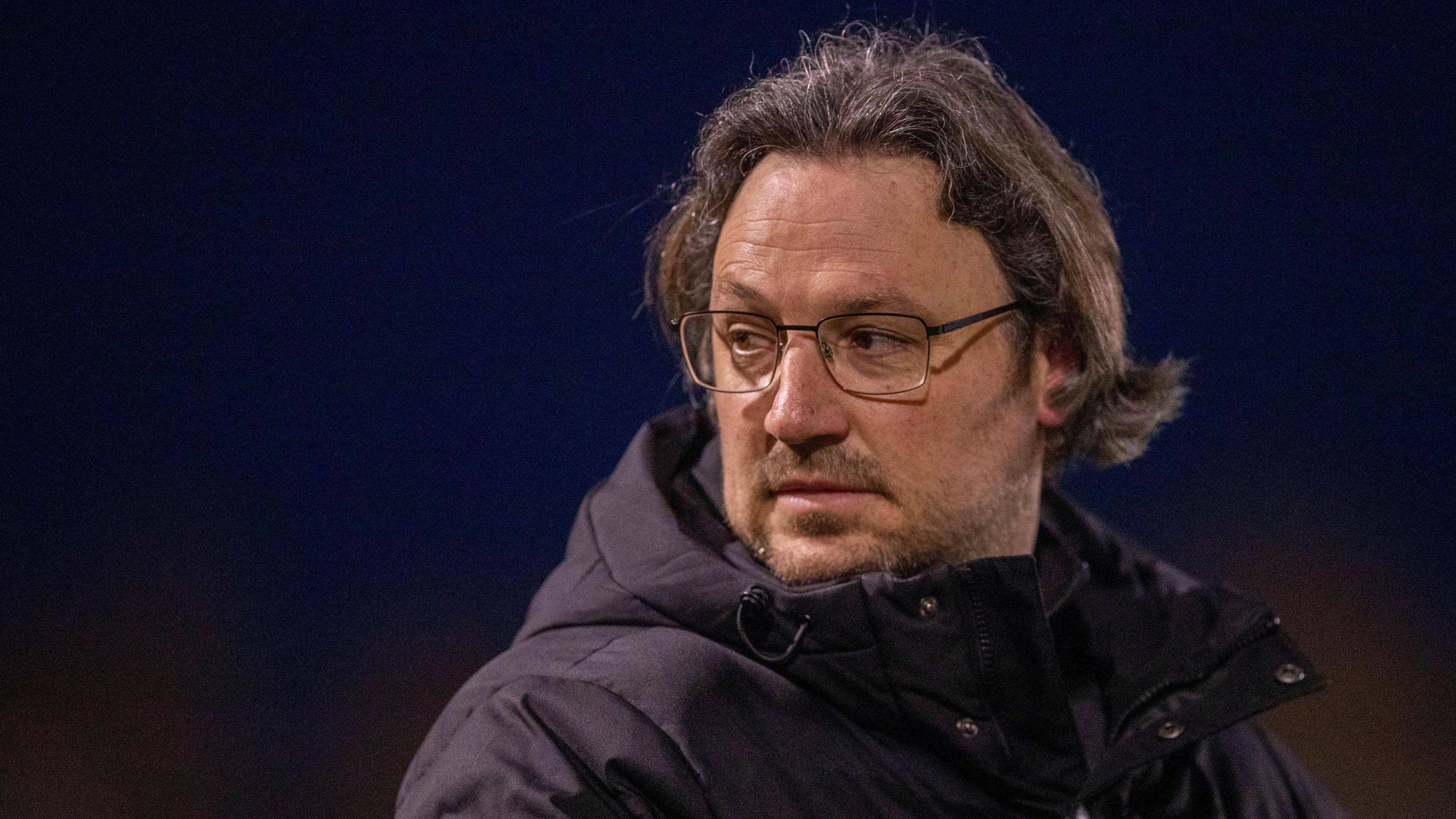 Craig Harrison looks on from the touchline during a game
